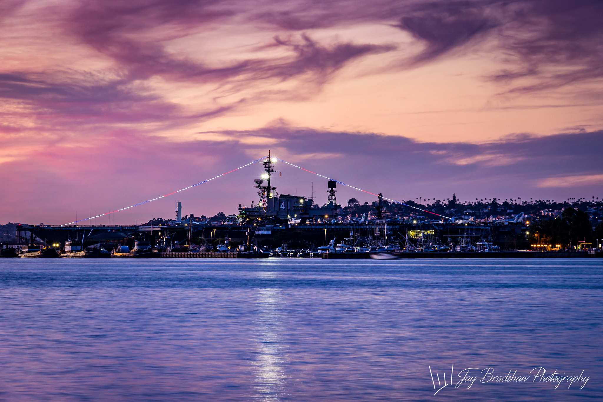Canon EOS 600D (Rebel EOS T3i / EOS Kiss X5) + Canon EF-S 18-135mm F3.5-5.6 IS STM sample photo. Uss midway at sunset photography