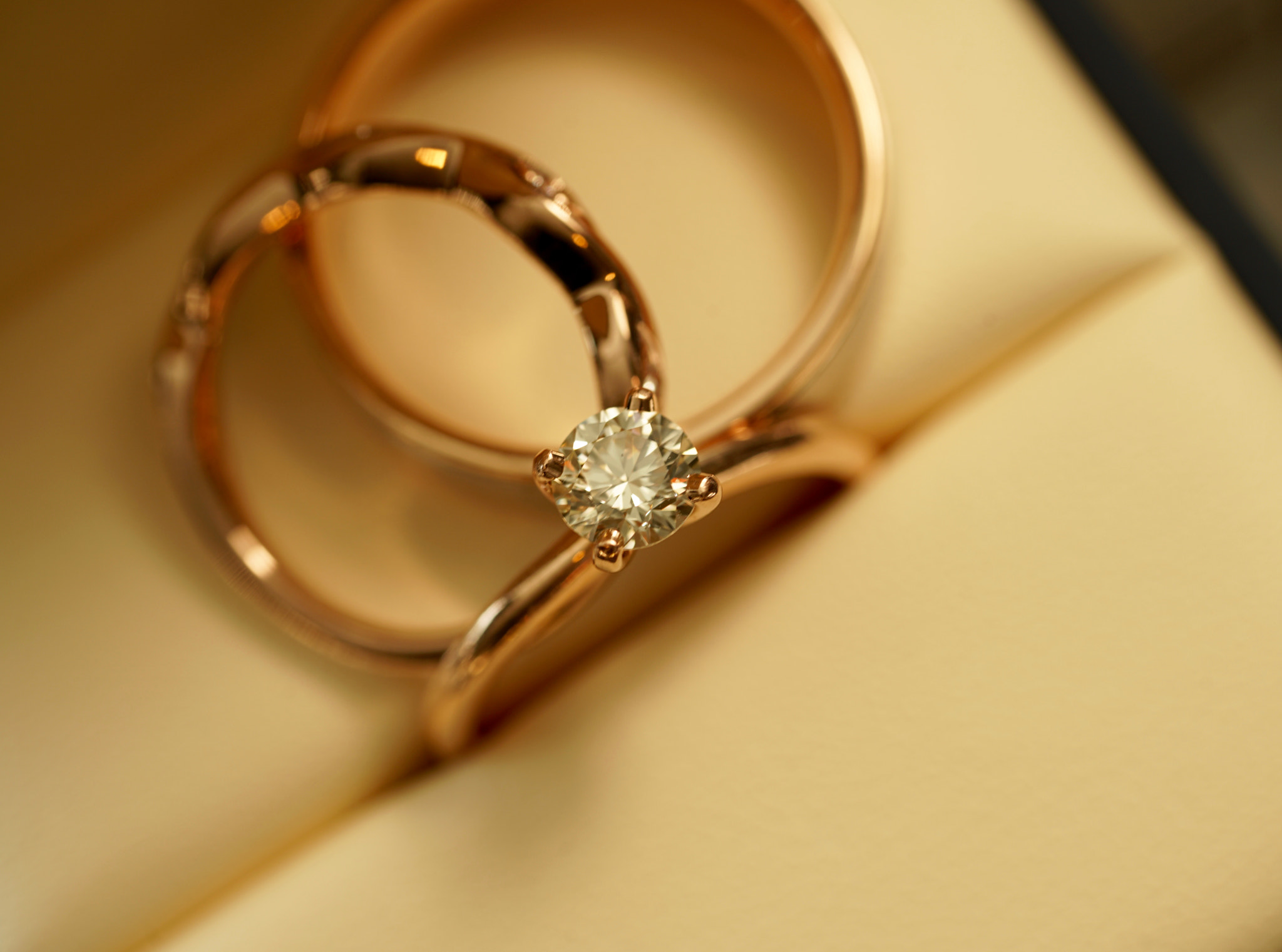 Sony a7R II + Sony FE 90mm F2.8 Macro G OSS sample photo. Rose gold diamond wedding and engagement ring photography