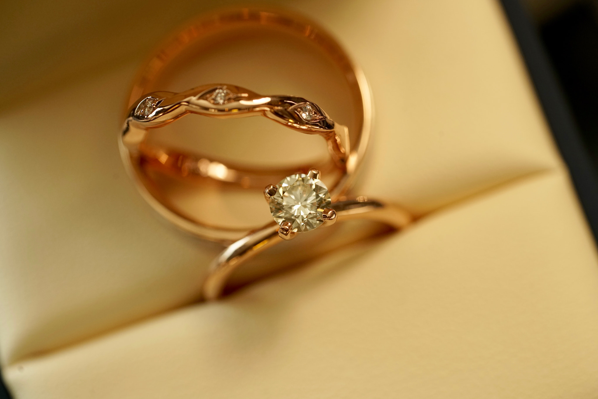 Sony a7R II + Sony FE 90mm F2.8 Macro G OSS sample photo. Rose gold diamond wedding and engagement ring photography