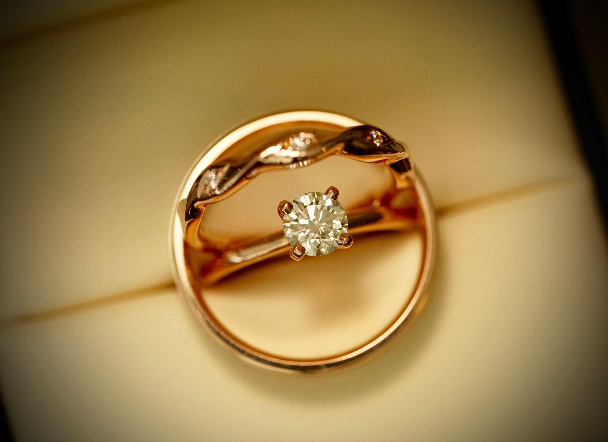Sony a7R II + Sony FE 90mm F2.8 Macro G OSS sample photo. Rose gold diamond wedding and engagement ring photography