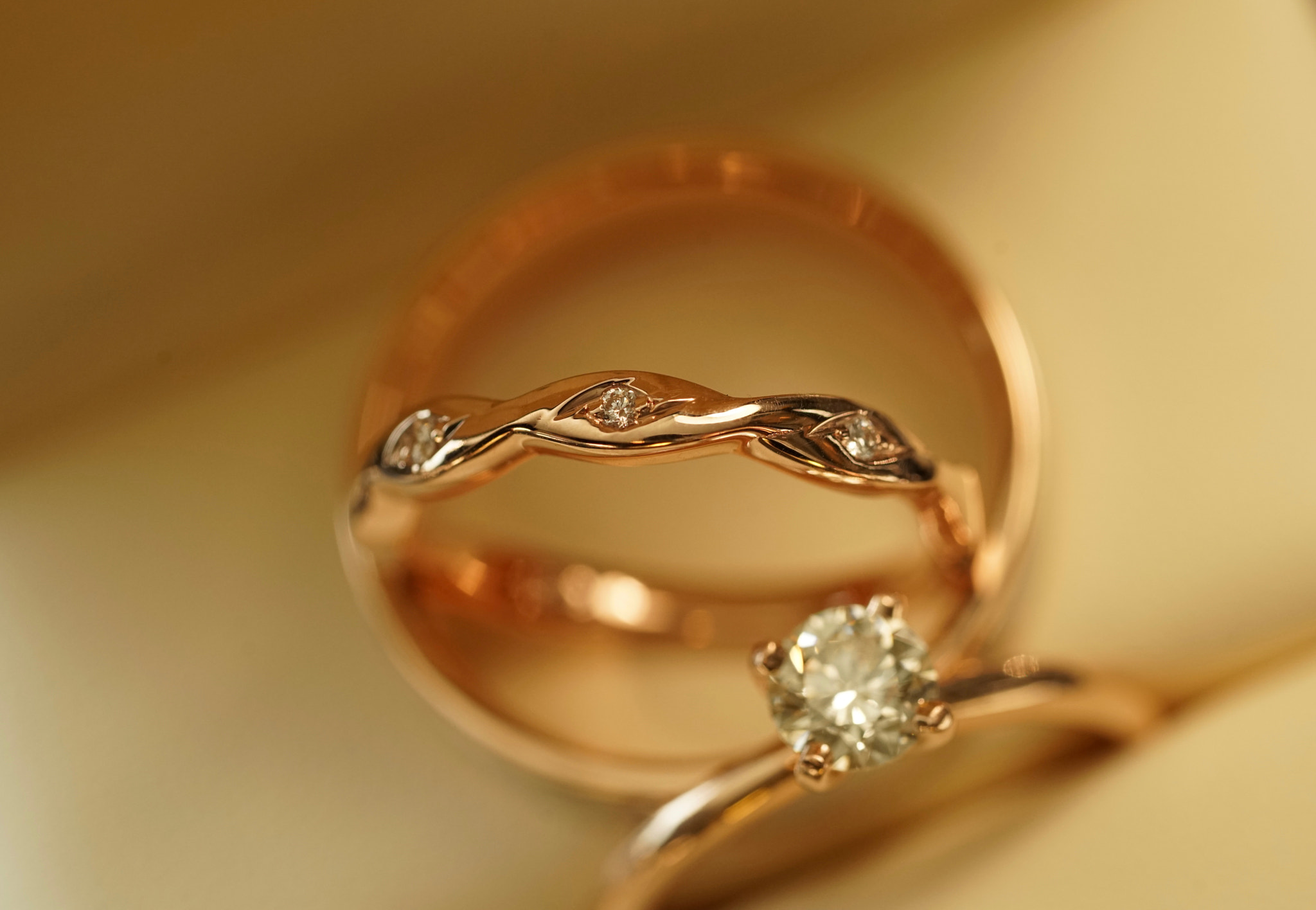 Sony a7R II + Sony FE 90mm F2.8 Macro G OSS sample photo. Rose gold diamond wedding and engagement ring photography