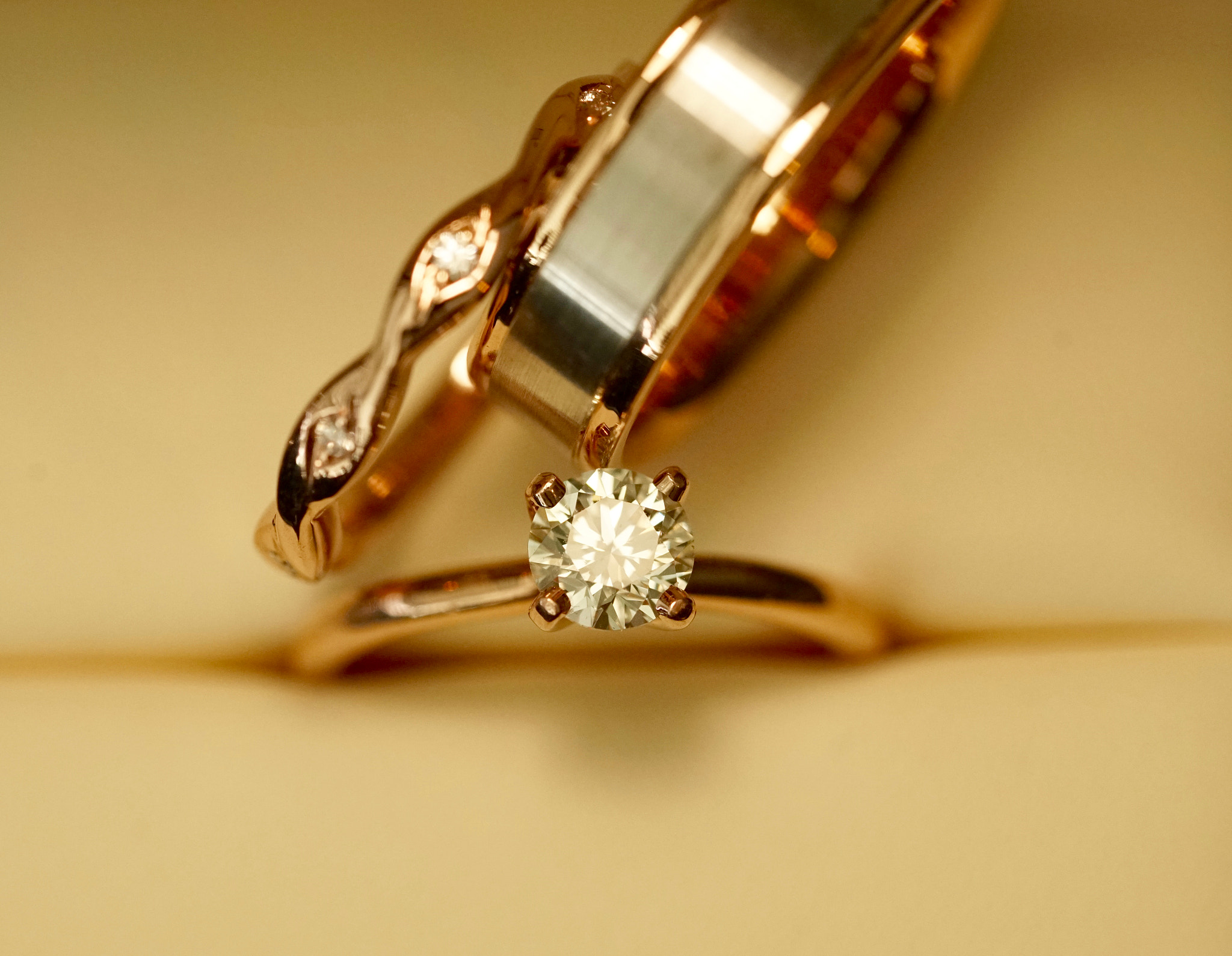 Sony a7R II + Sony FE 90mm F2.8 Macro G OSS sample photo. Rose gold diamond wedding and engagement ring photography