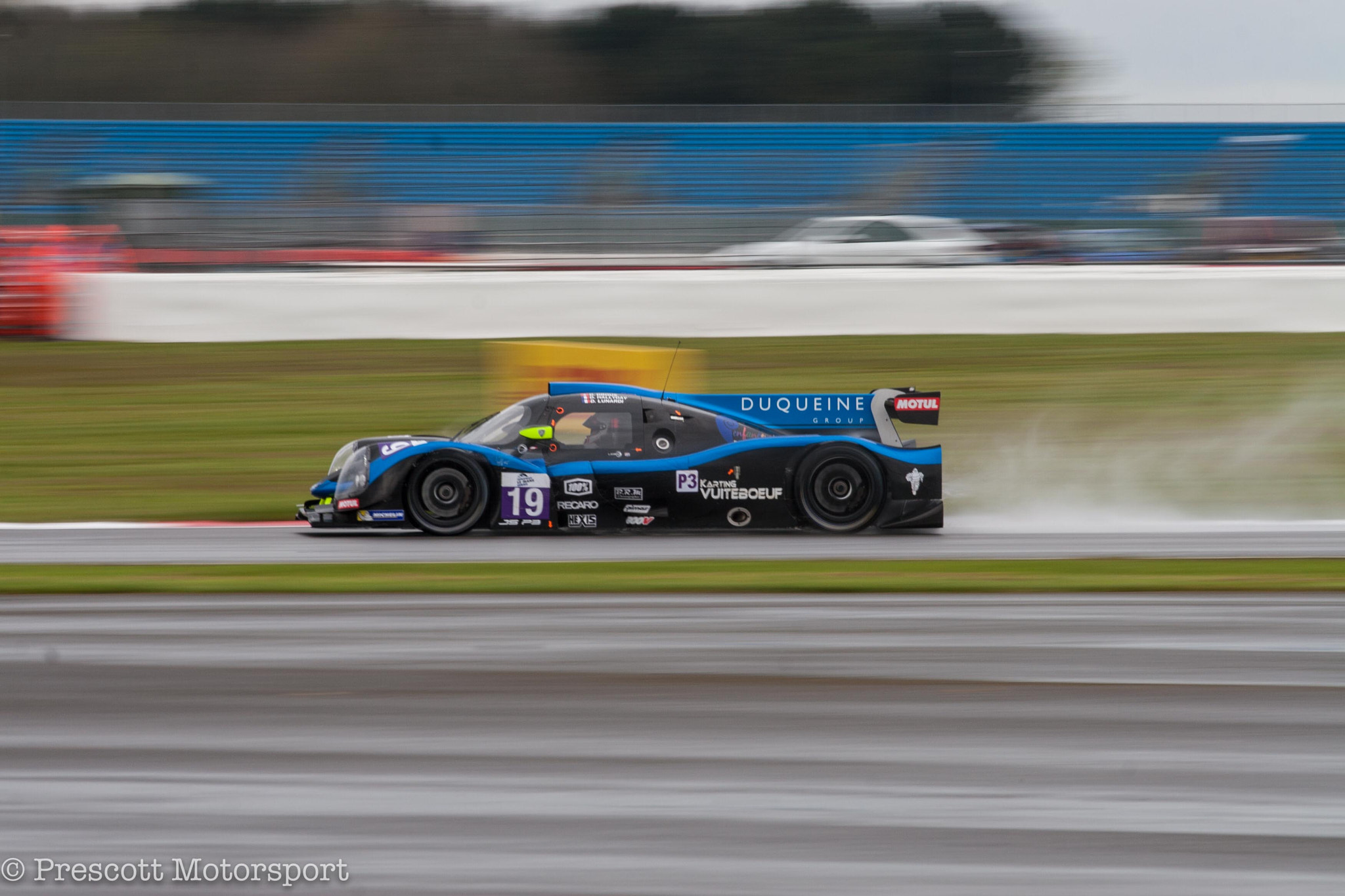 Canon EOS 30D + Canon EF 70-200mm F4L USM sample photo. Elms in the rain at silverstone photography