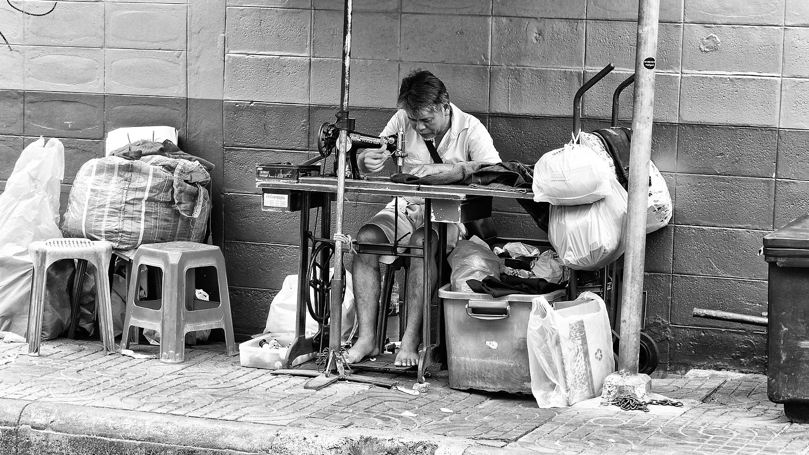 Panasonic Lumix DMC-GF7 sample photo. Tailor on the street photography