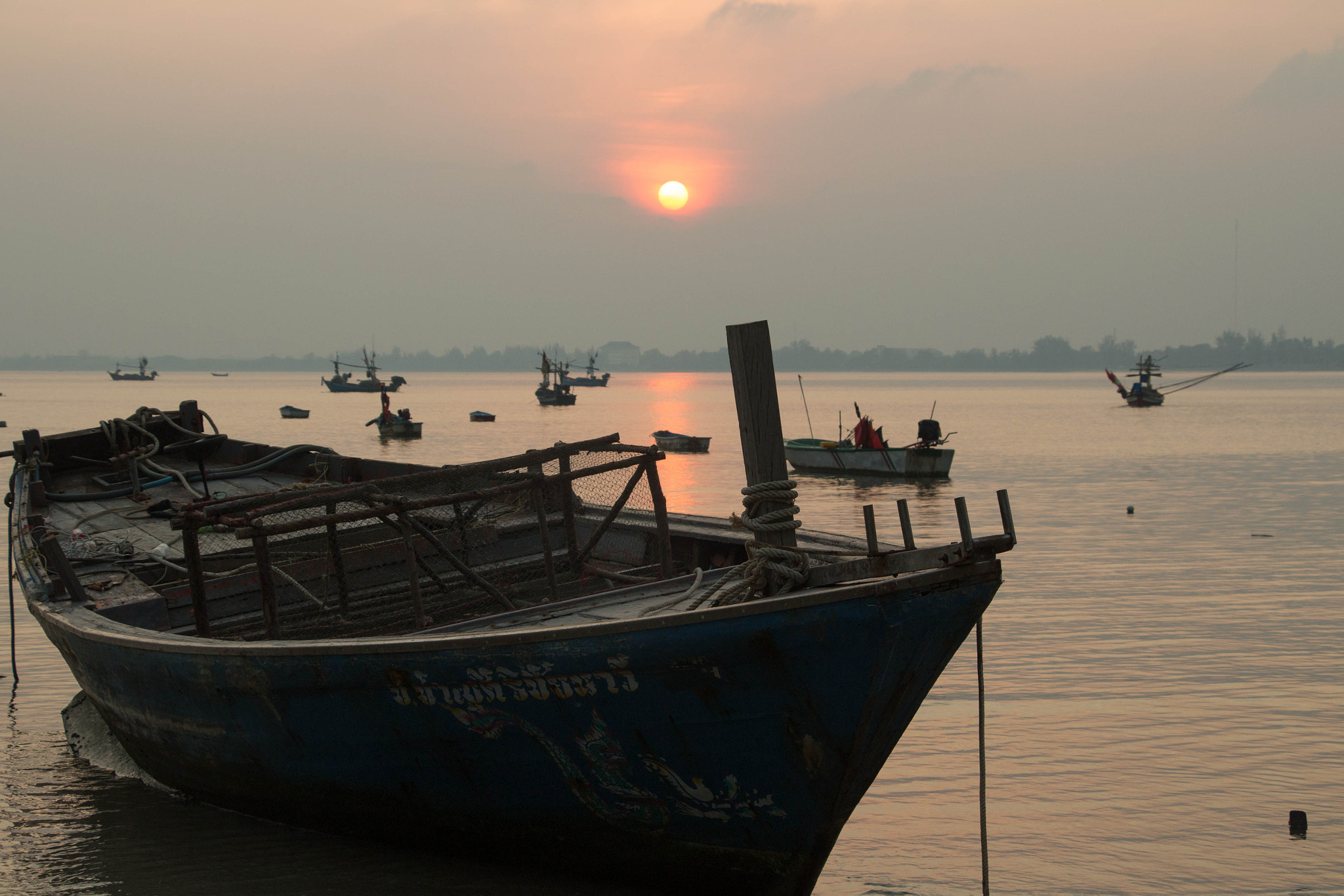 Canon EF-S 18-135mm F3.5-5.6 IS STM sample photo. Fishing boats at sunset photography