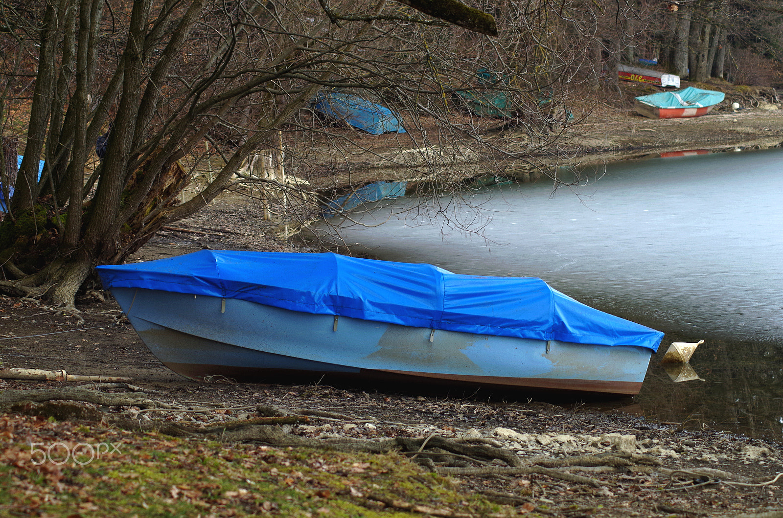 Tamron AF 70-300mm F4-5.6 Di LD Macro sample photo. Small boat out of a frozen lake photography