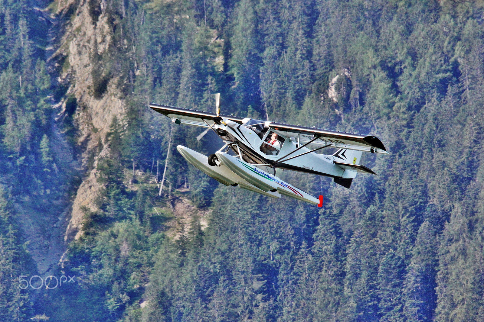 Sigma 150-500mm F5-6.3 DG OS HSM sample photo. White seaplane beside the mountain photography