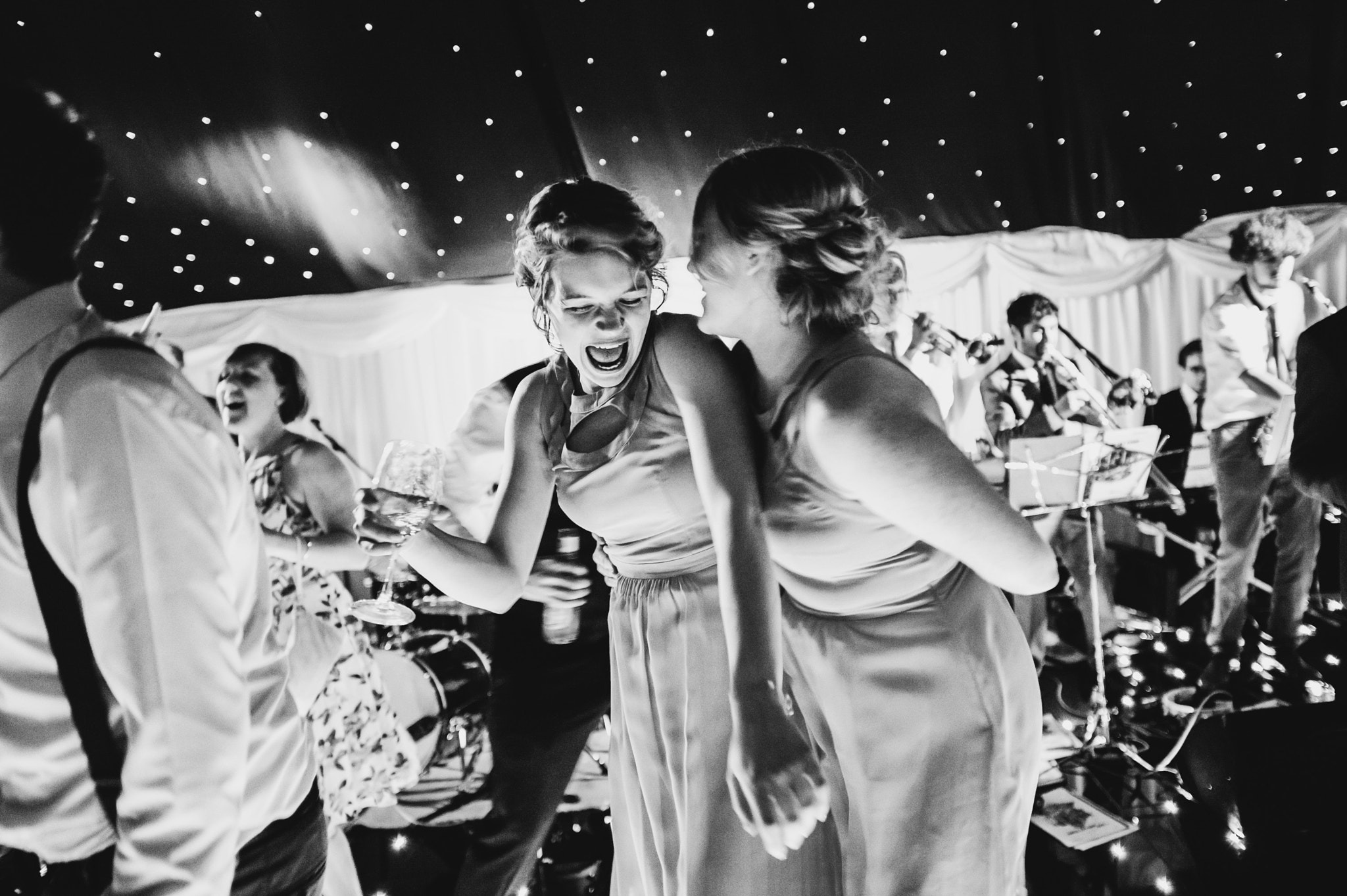 Nikon AF-S Nikkor 24mm F1.4G ED sample photo. Dancing bridesmaids photography