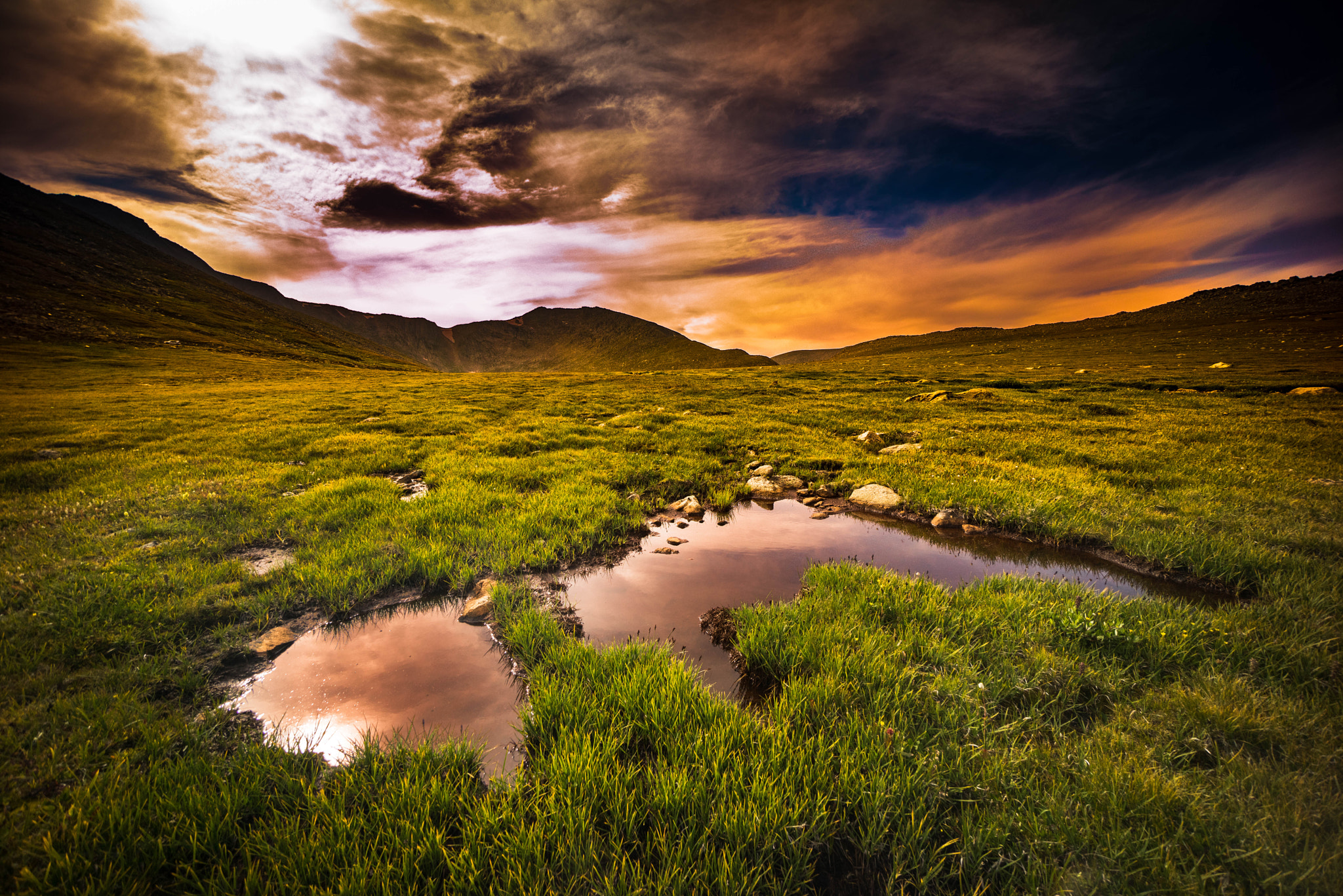 Sony a7R + Sony E 10-18mm F4 OSS sample photo. Alpine pond as the sun dips photography