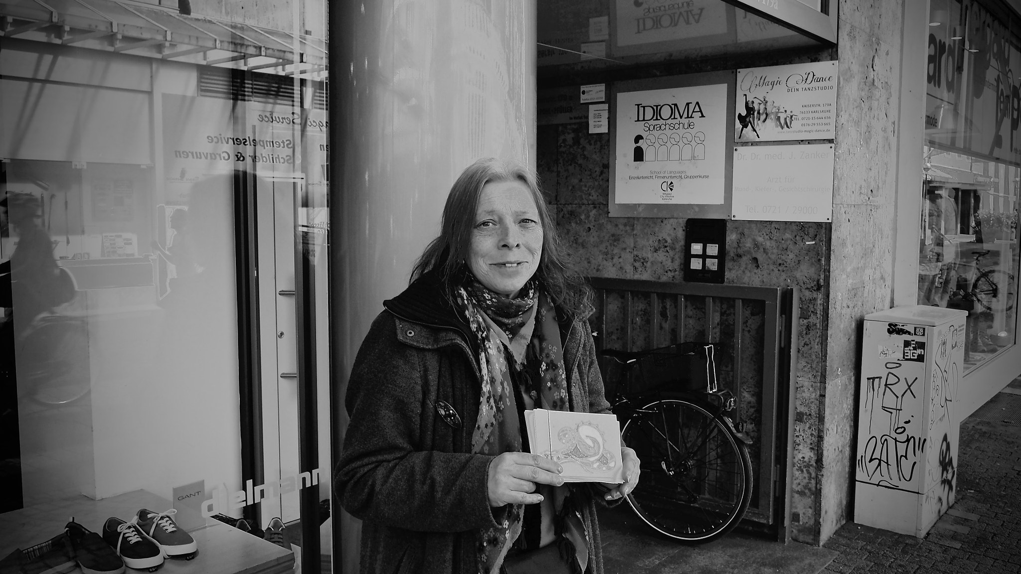 Olympus OM-D E-M10 + Panasonic Lumix G 14mm F2.5 ASPH sample photo. Homeless photography