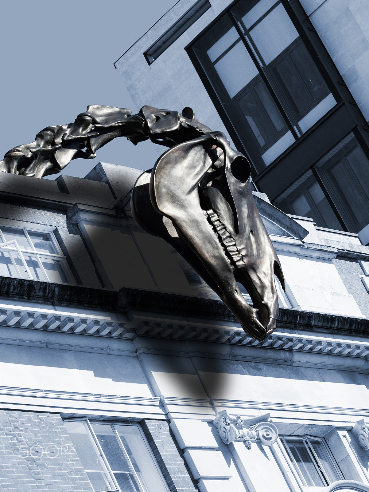 Canon EF 100-400mm F4.5-5.6L IS II USM sample photo. Dinosaur and buildings photography