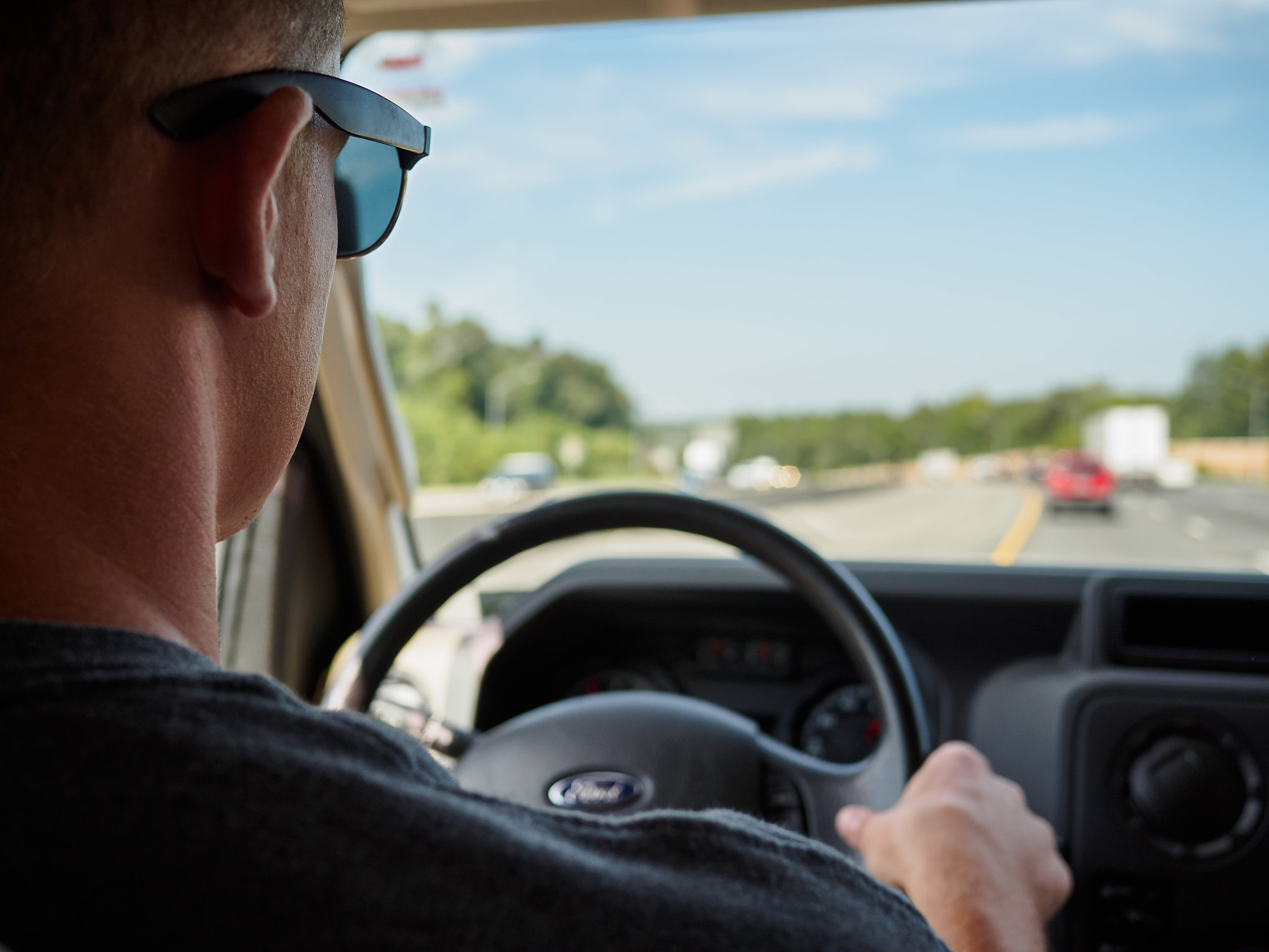 Olympus OM-D E-M10 + Panasonic Lumix G 20mm F1.7 ASPH sample photo. Behind the wheel photography