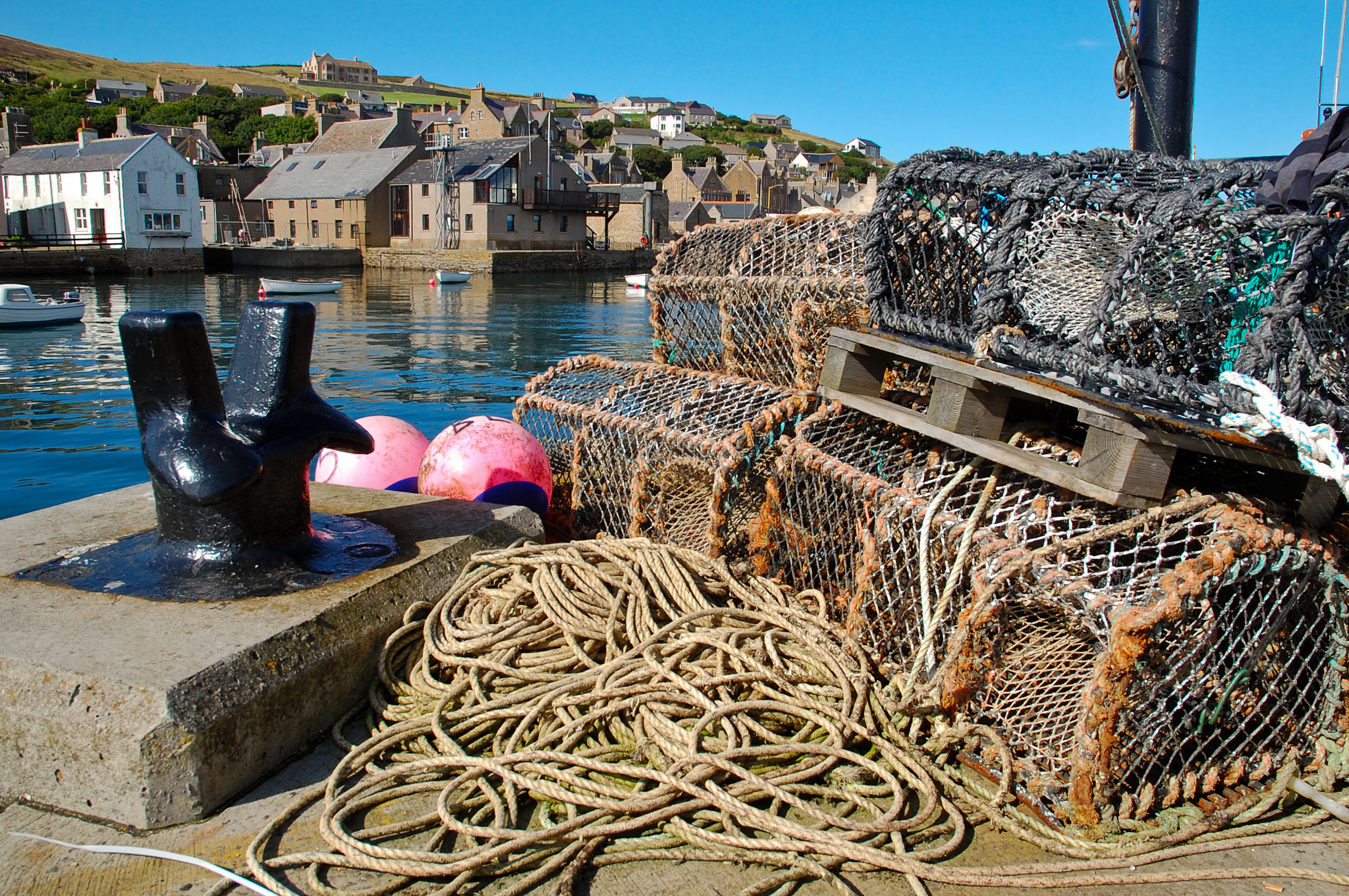 Nikon D40 sample photo. Lobster creels on the pier at stromness harbou photography