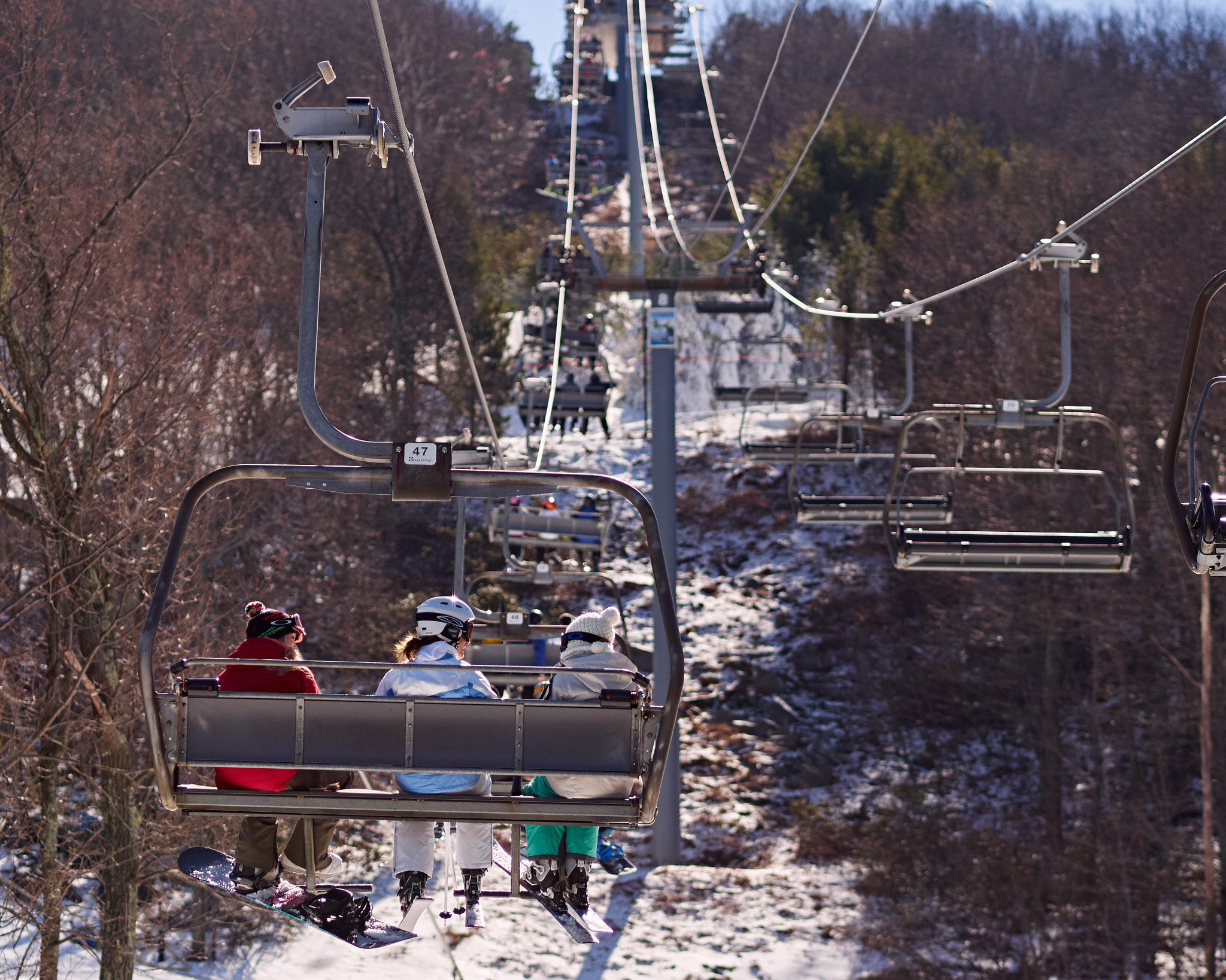 Olympus OM-D E-M10 + Olympus M.Zuiko Digital ED 75mm F1.8 sample photo. Ski lift photography