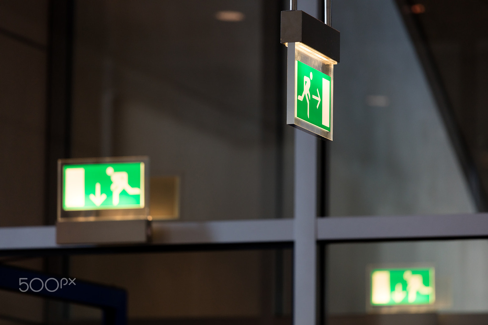 Canon EF 70-200mm F4L IS USM sample photo. Escape signs in green photography