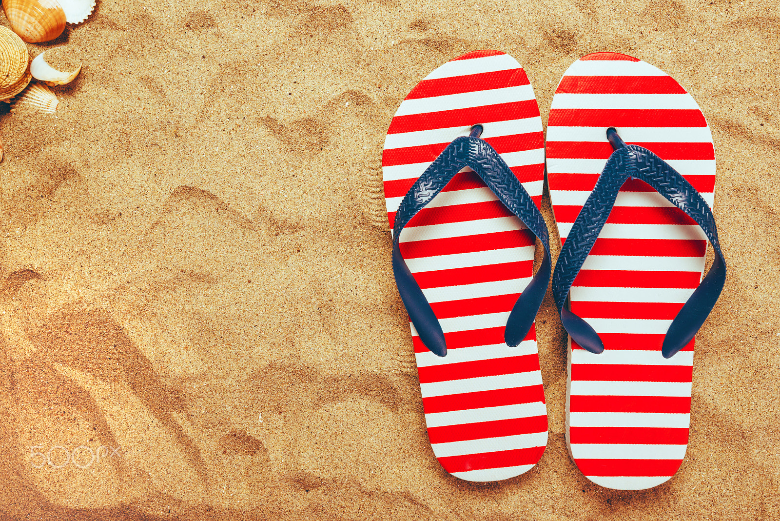 Tamron SP 15-30mm F2.8 Di VC USD sample photo. Pair of thongs or flip flops on beach sand photography