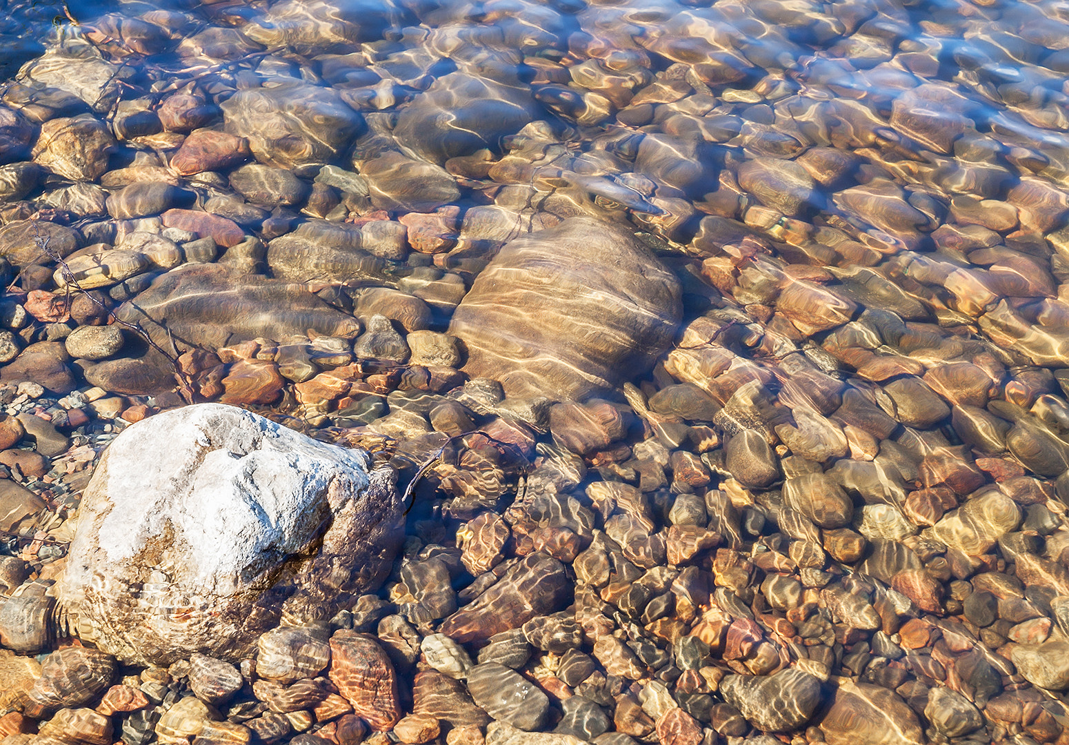 Olympus Zuiko Digital ED 12-60mm F2.8-4.0 SWD sample photo. Lake stones photography