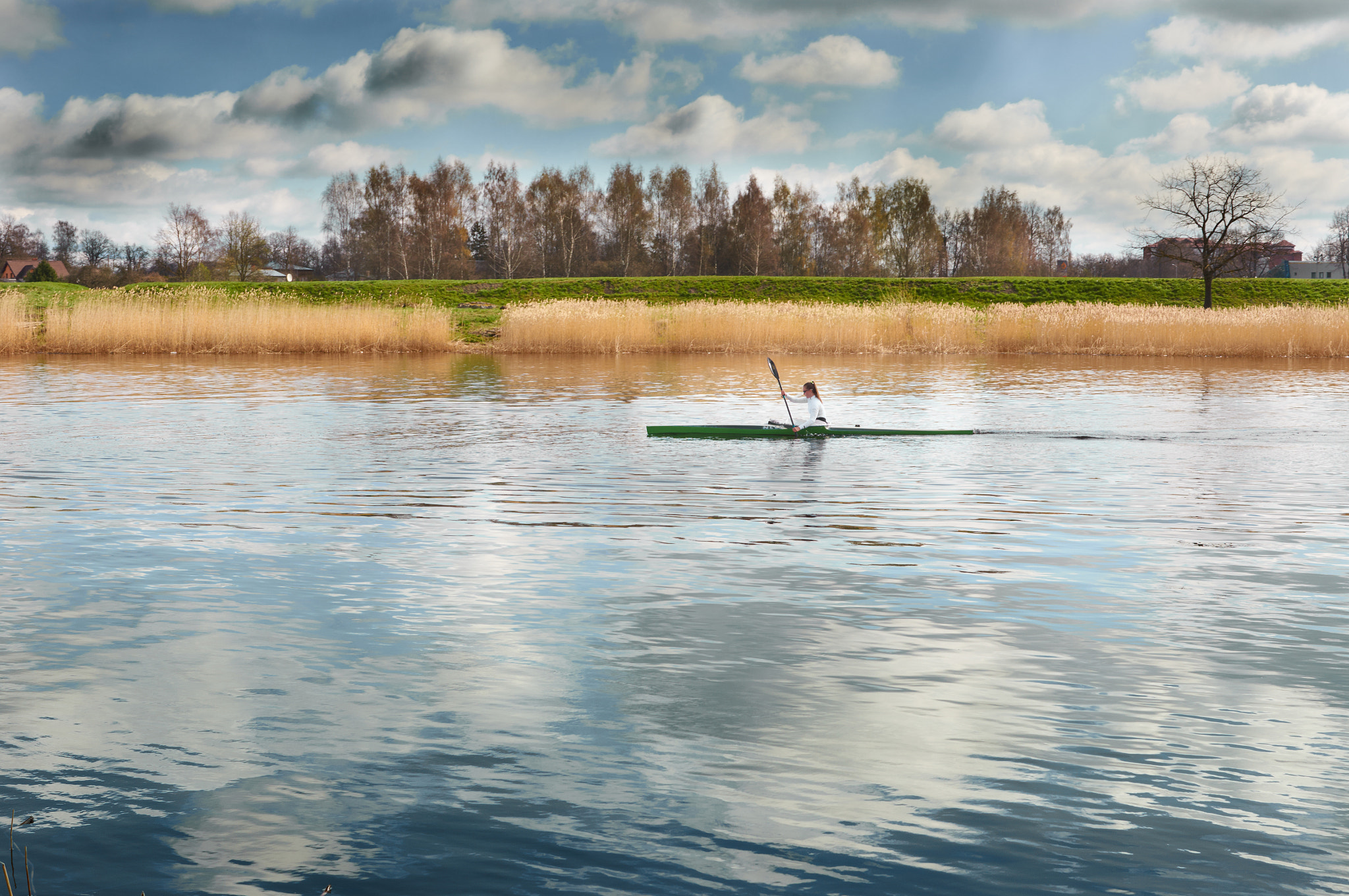 Sony SLT-A57 + Sony DT 35mm F1.8 SAM sample photo. Girl kayaking in rive 1 photography