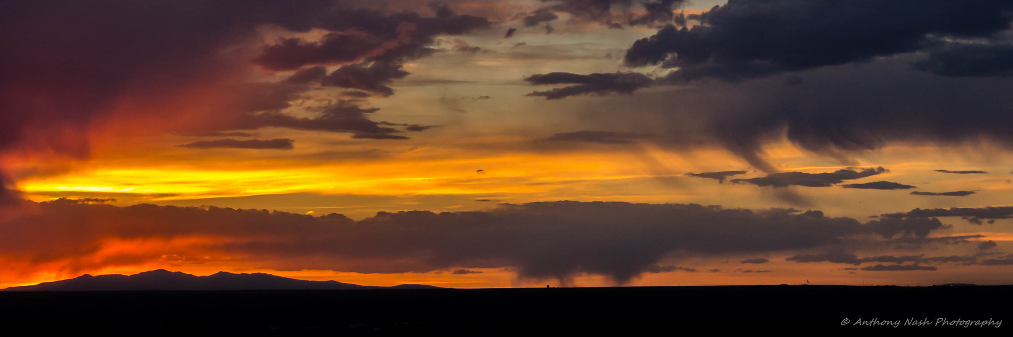 Nikon 1 Nikkor VR 30-110mm F3.8-5.6 sample photo. Mt taylor on fire photography