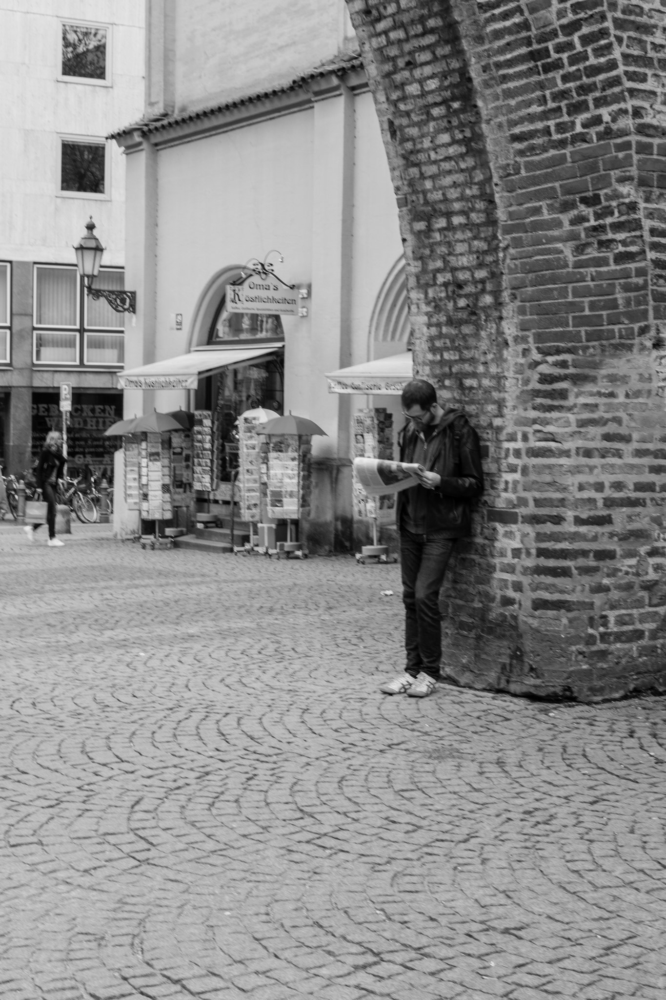 Sigma 30mm F2.8 EX DN sample photo. Reading newspaper photography