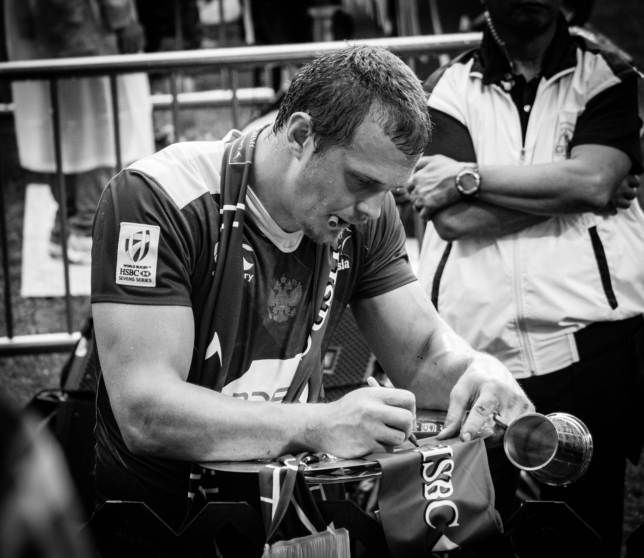 Panasonic Lumix G Vario 45-200mm F4-5.6 OIS sample photo. Rugby player signing autograph photography