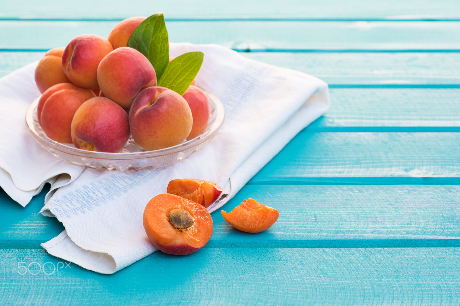 Nikon D810 + Sigma 70mm F2.8 EX DG Macro sample photo. Fresh homegrown apricots on pastel blue wooden table photography