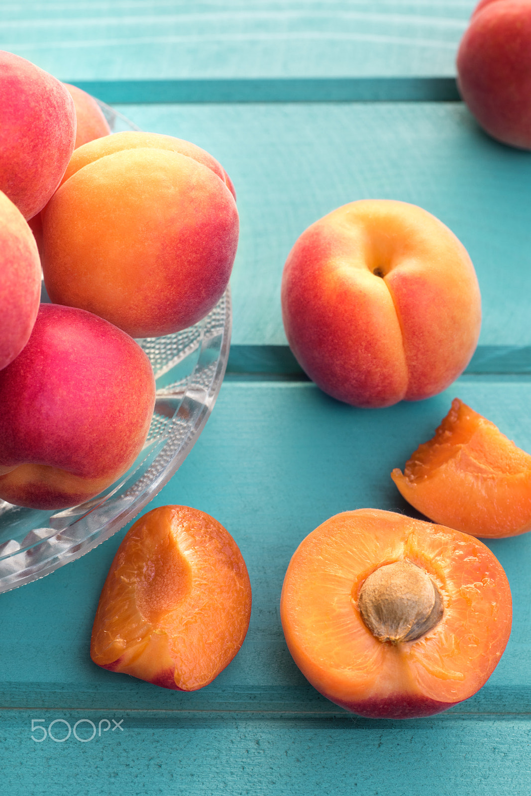 Nikon D810 + Sigma 70mm F2.8 EX DG Macro sample photo. Fresh homegrown apricots on pastel blue wooden table photography