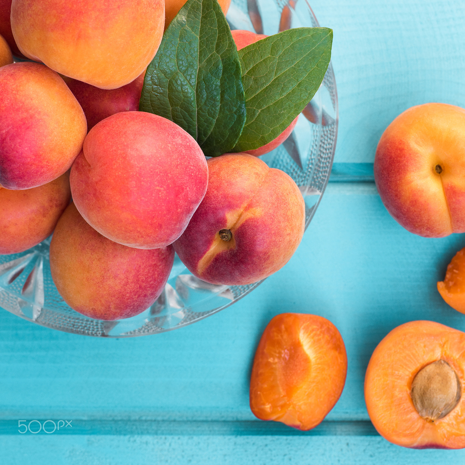 Nikon D810 + Sigma 70mm F2.8 EX DG Macro sample photo. Fresh homegrown apricots on pastel blue wooden table photography