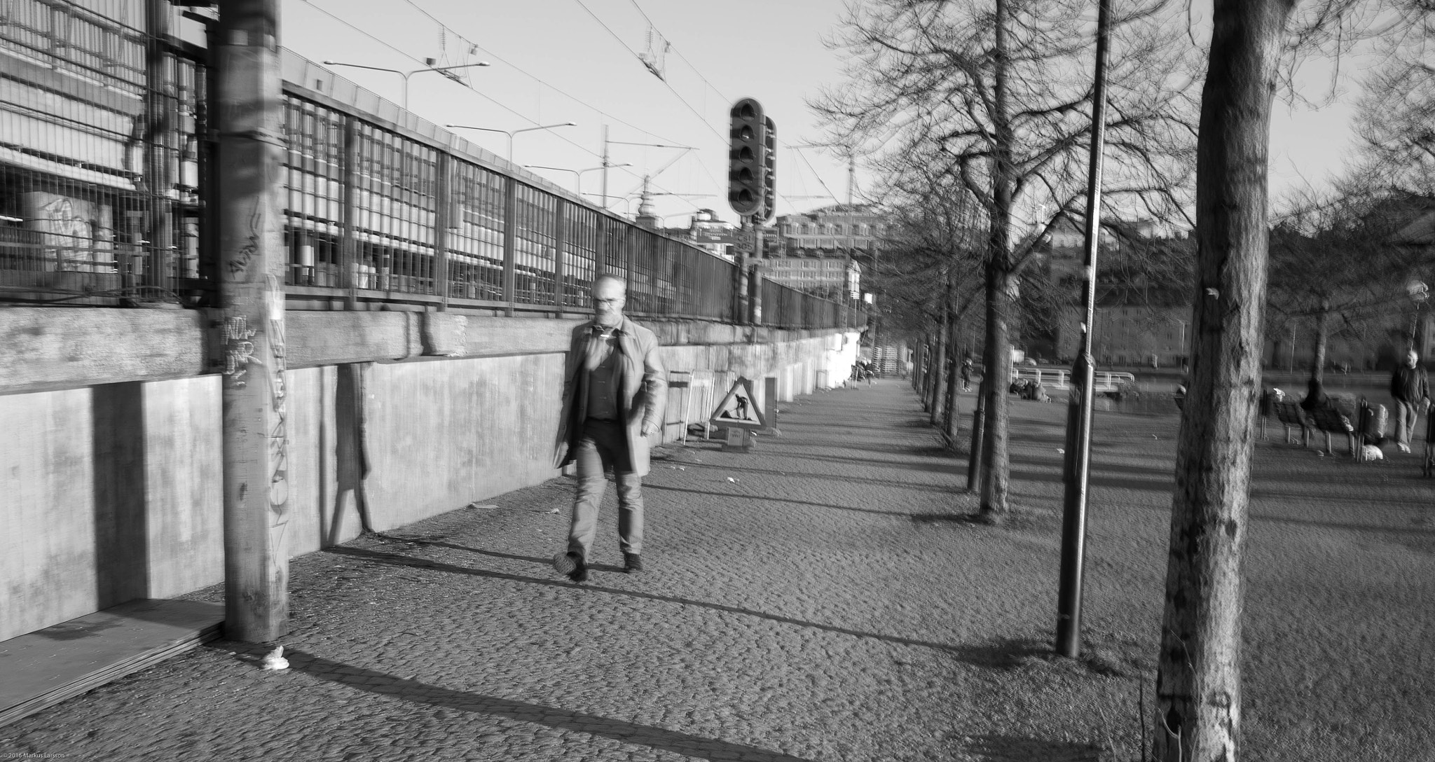 Olympus M.Zuiko Digital 17mm F1.8 sample photo. Man walking, old town subway station photography