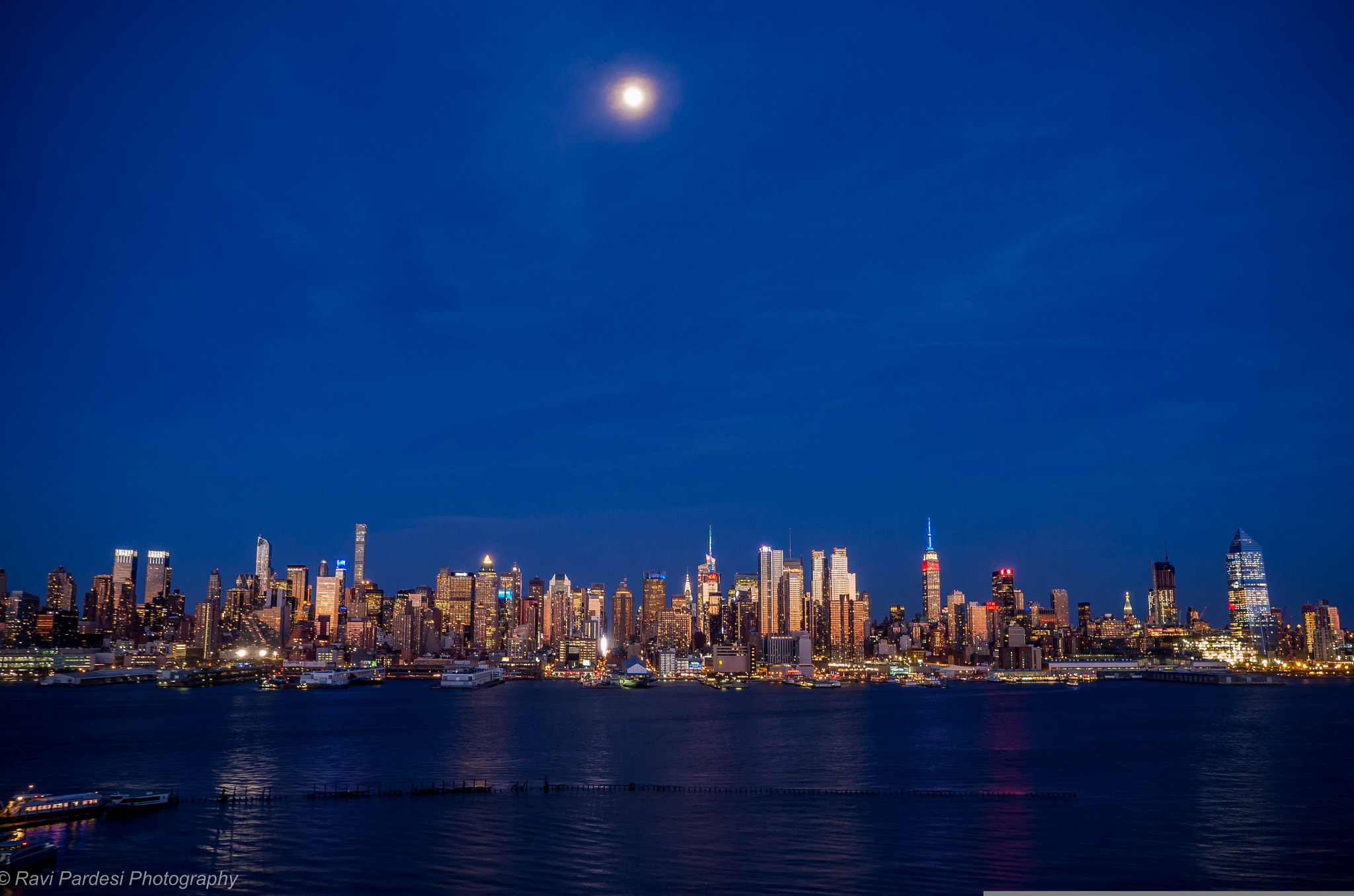 Olympus Zuiko Digital ED 12-60mm F2.8-4.0 SWD sample photo. Nyc skyline with full moon photography