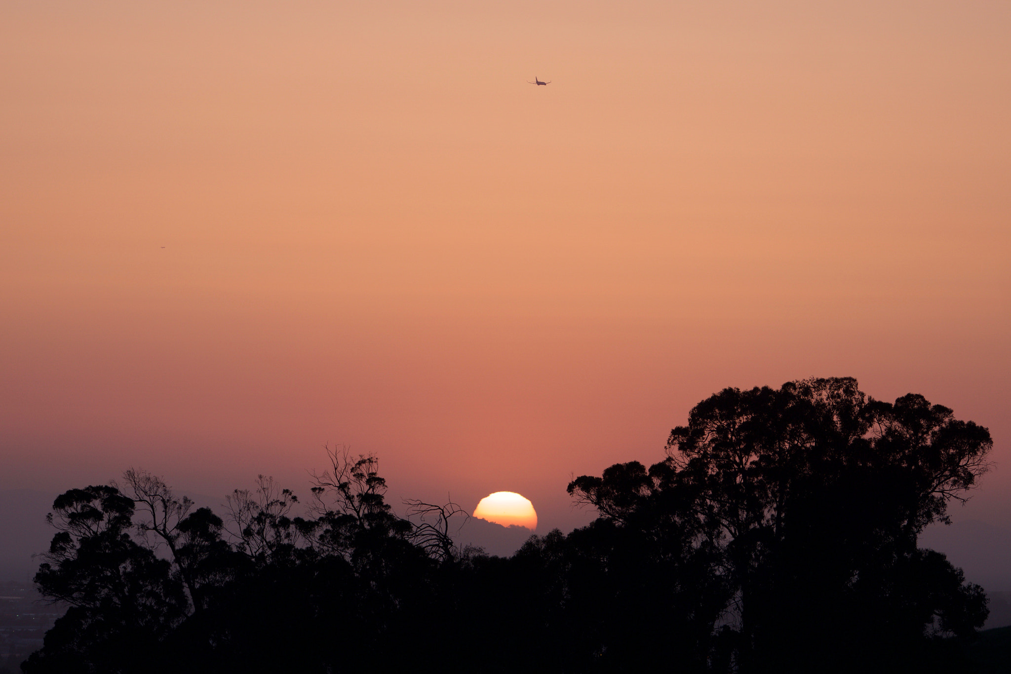 Sony a6000 + Sony FE 70-200mm F4 G OSS sample photo. Sunset with silhouette photography