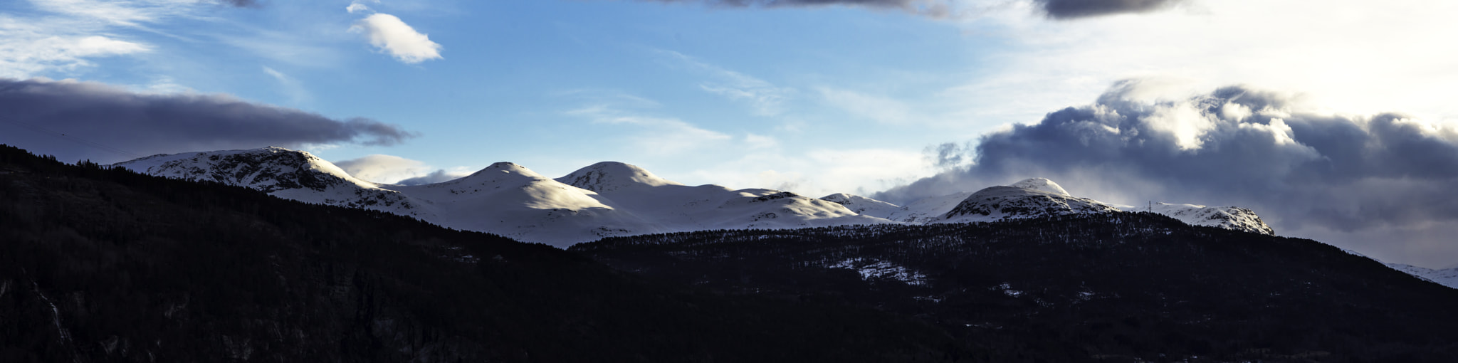 Sigma APO 50-150mm f/2.8 [II] EX DC HSM sample photo. Mountaintops lit by the days first light photography