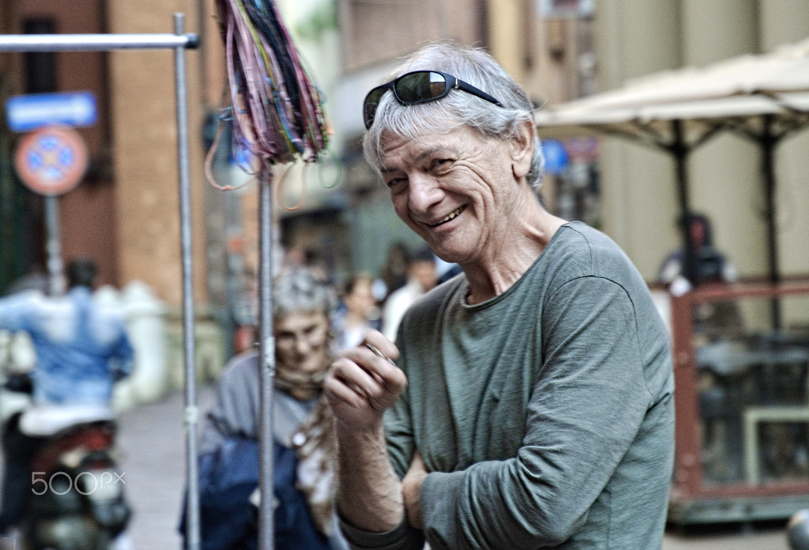 Nikon 1 Nikkor VR 30-110mm F3.8-5.6 sample photo. Smiling man photography