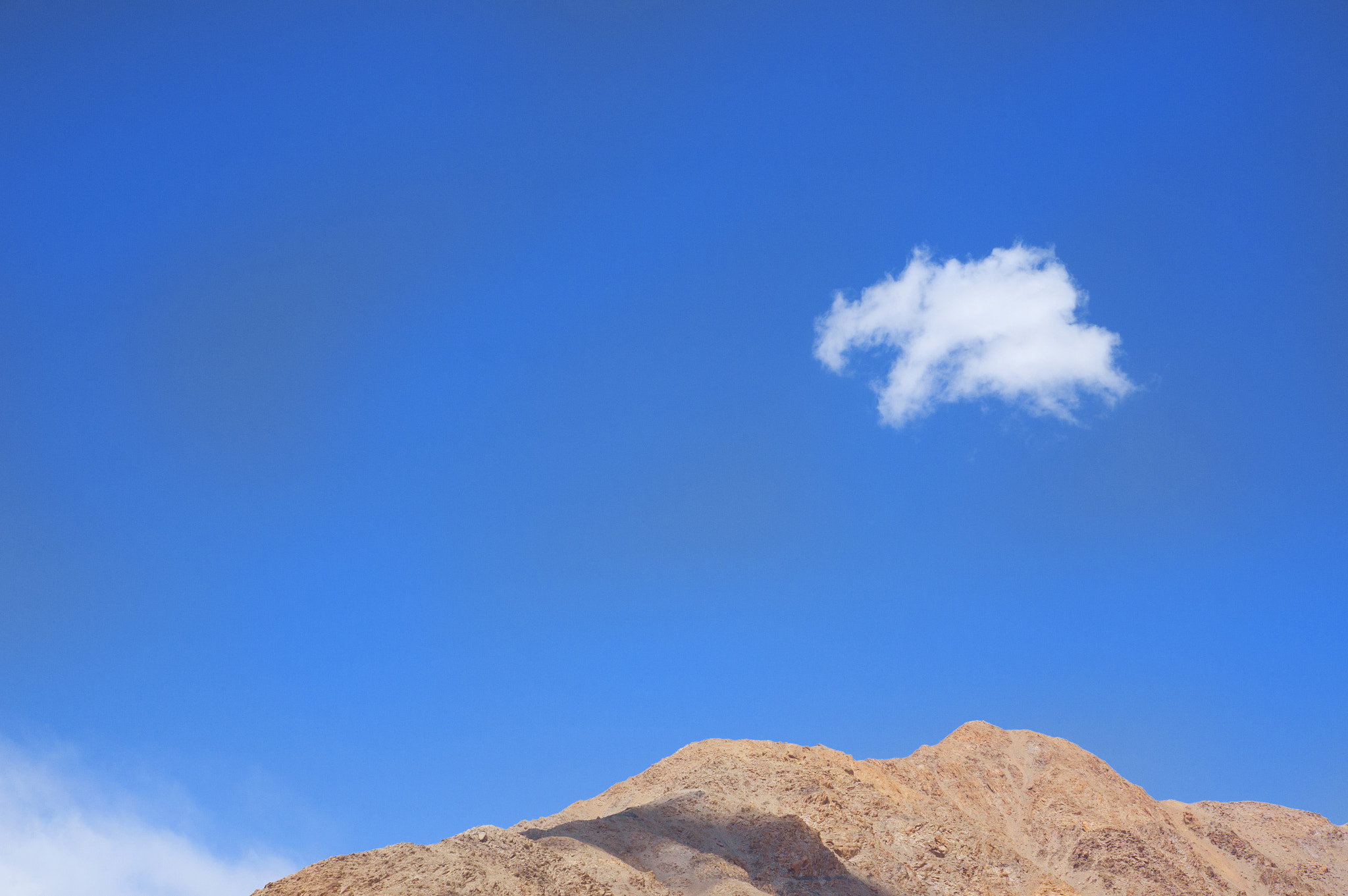 Sony Alpha NEX-6 + Sony E 18-55mm F3.5-5.6 OSS sample photo. Single cloud over ladakh photography