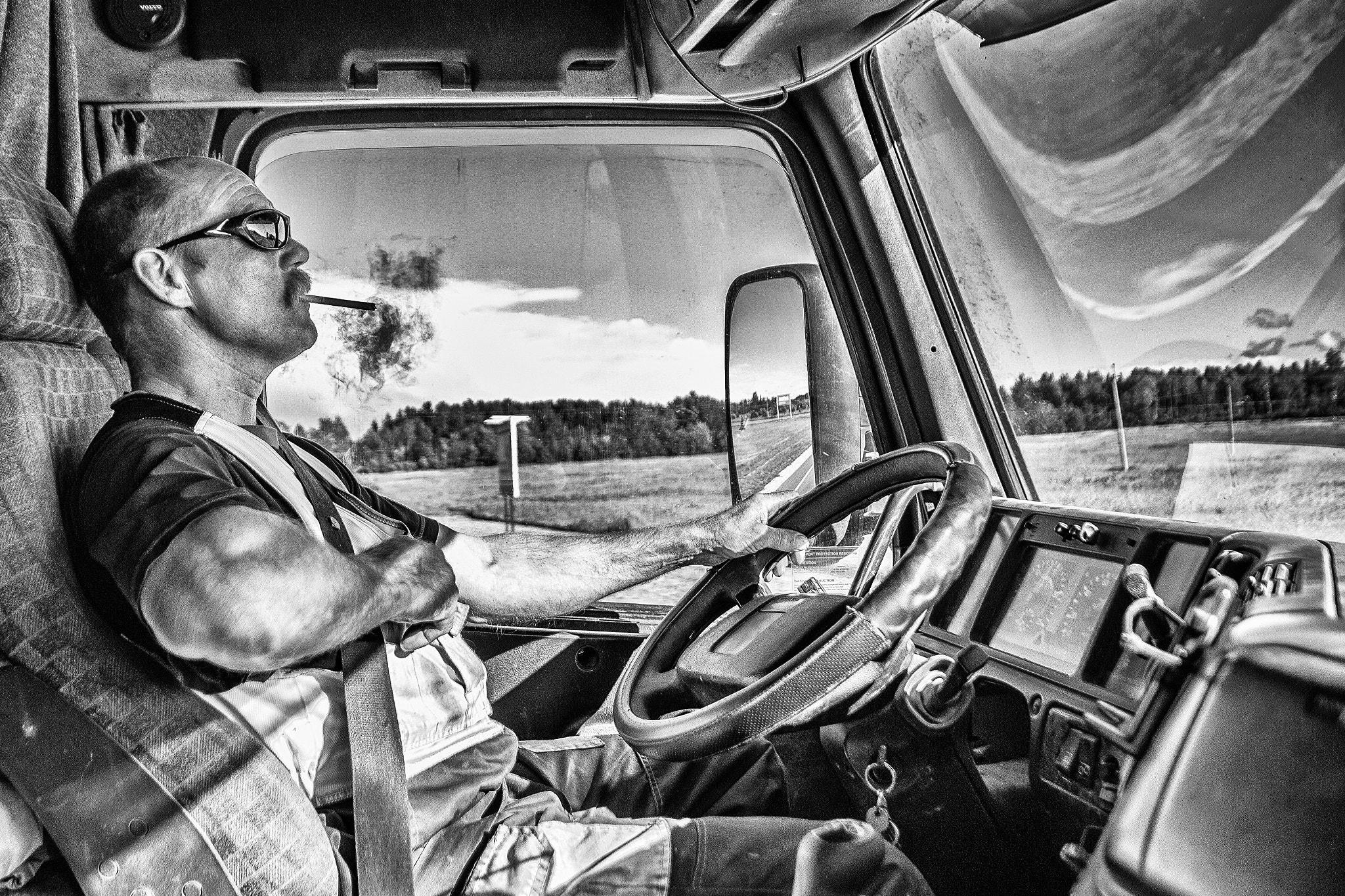 Canon EOS 70D + Sigma 18-50mm f/2.8 Macro sample photo. Truckdriver photography
