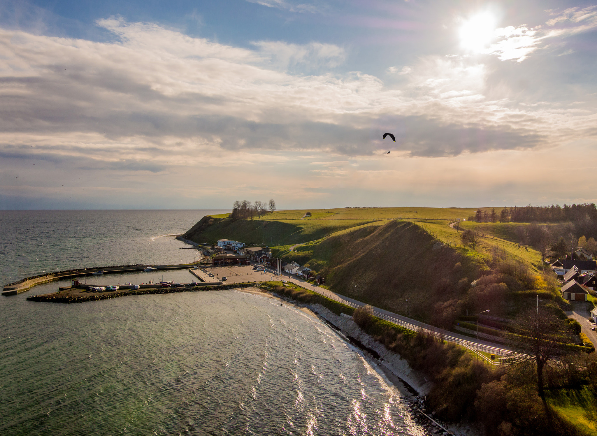 Panasonic Lumix G Vario 7-14mm F4 ASPH sample photo. Paragliding kåseberga harbor photography