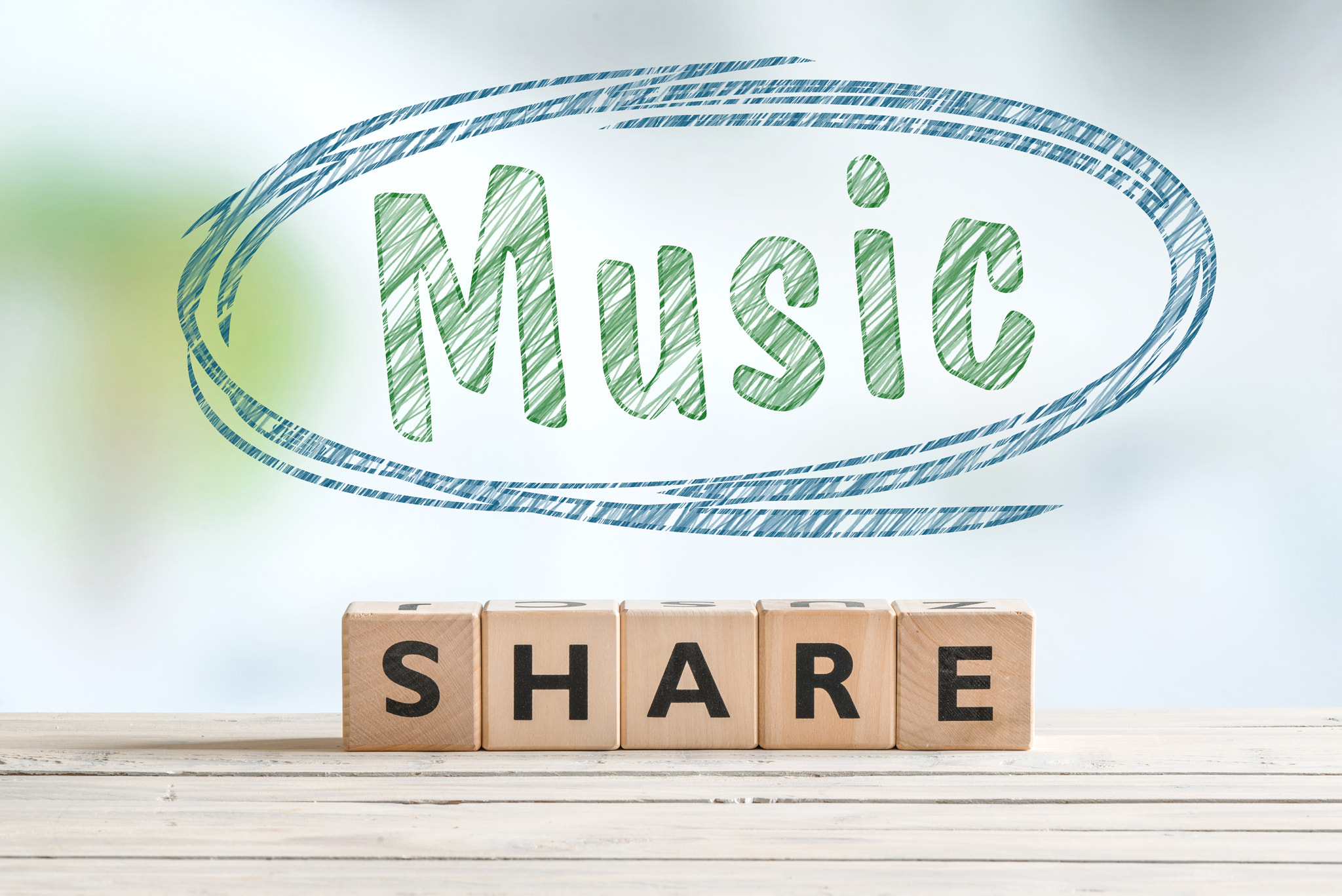 Music share sign on a table