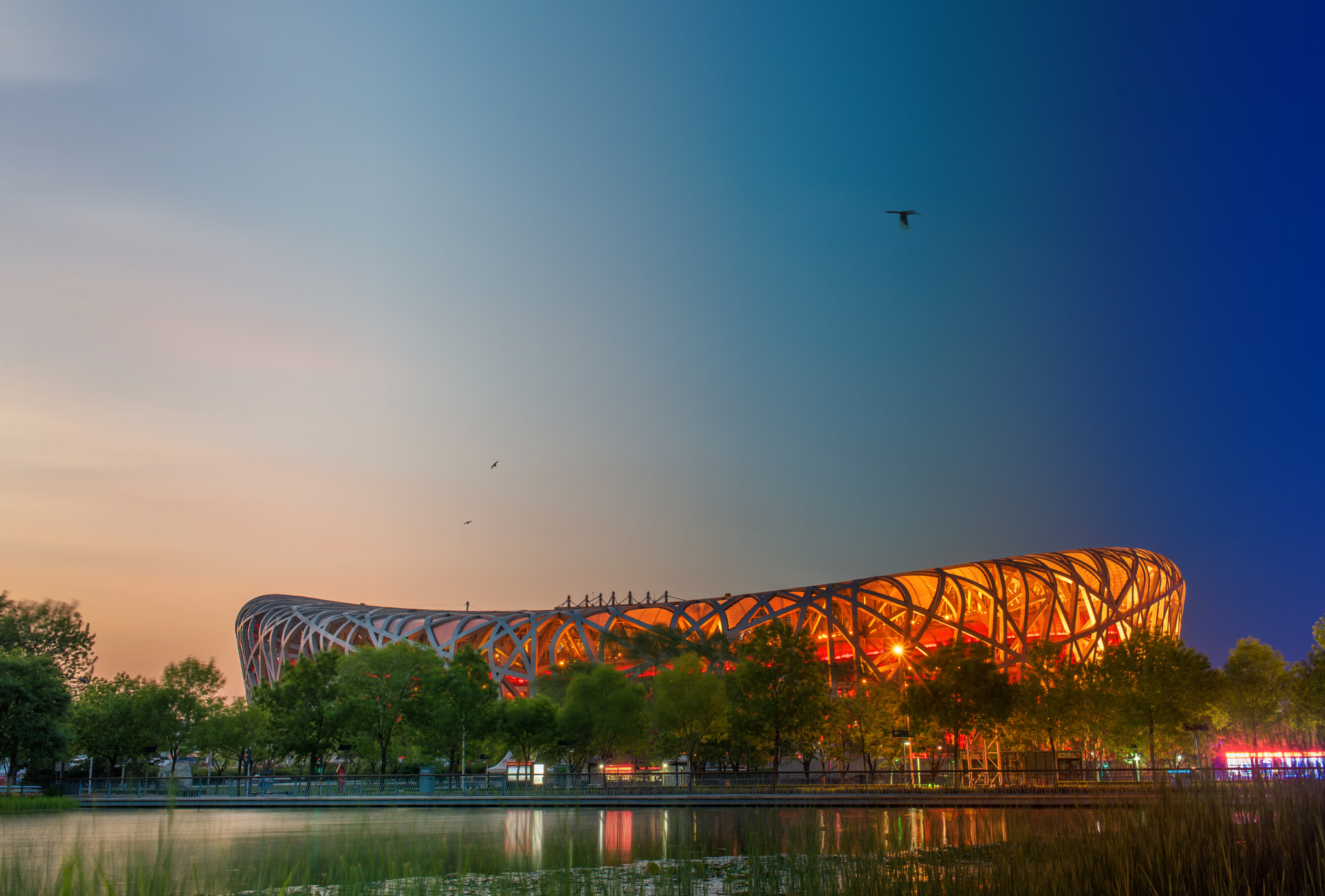 AF-S Nikkor 35mm f/1.8G sample photo. Time slice of "bird's nest" stadium photography