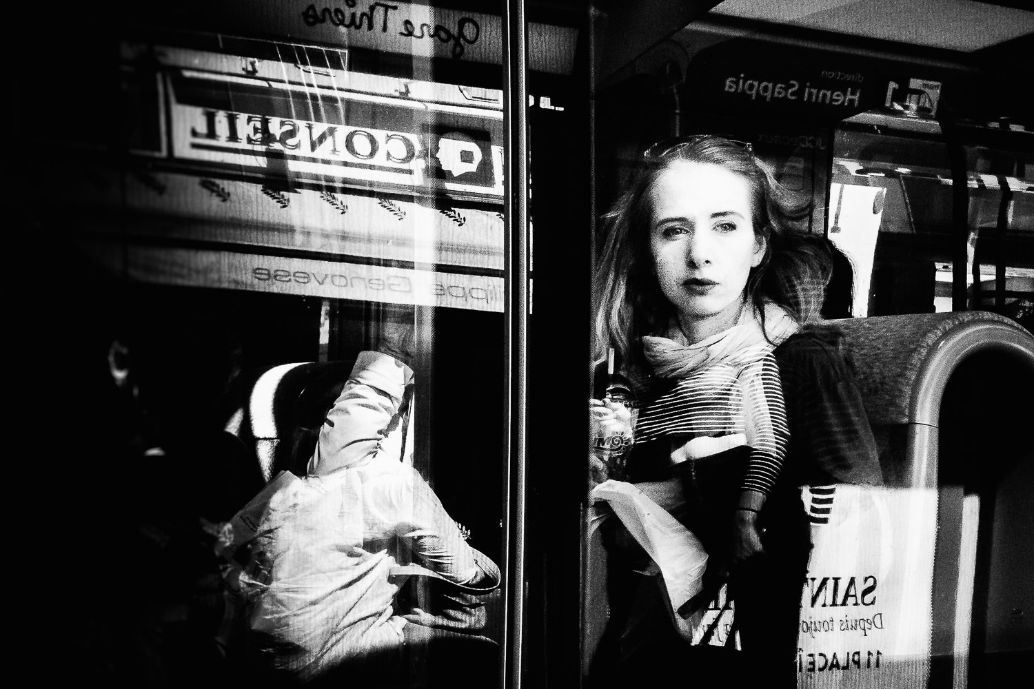Olympus OM-D E-M10 II + LUMIX G 20/F1.7 II sample photo. Woman in tram photography