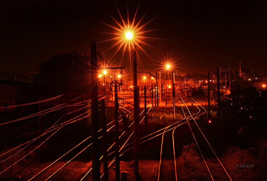 Canon EF 50mm f/1.8 + 1.4x sample photo. Railway station photography