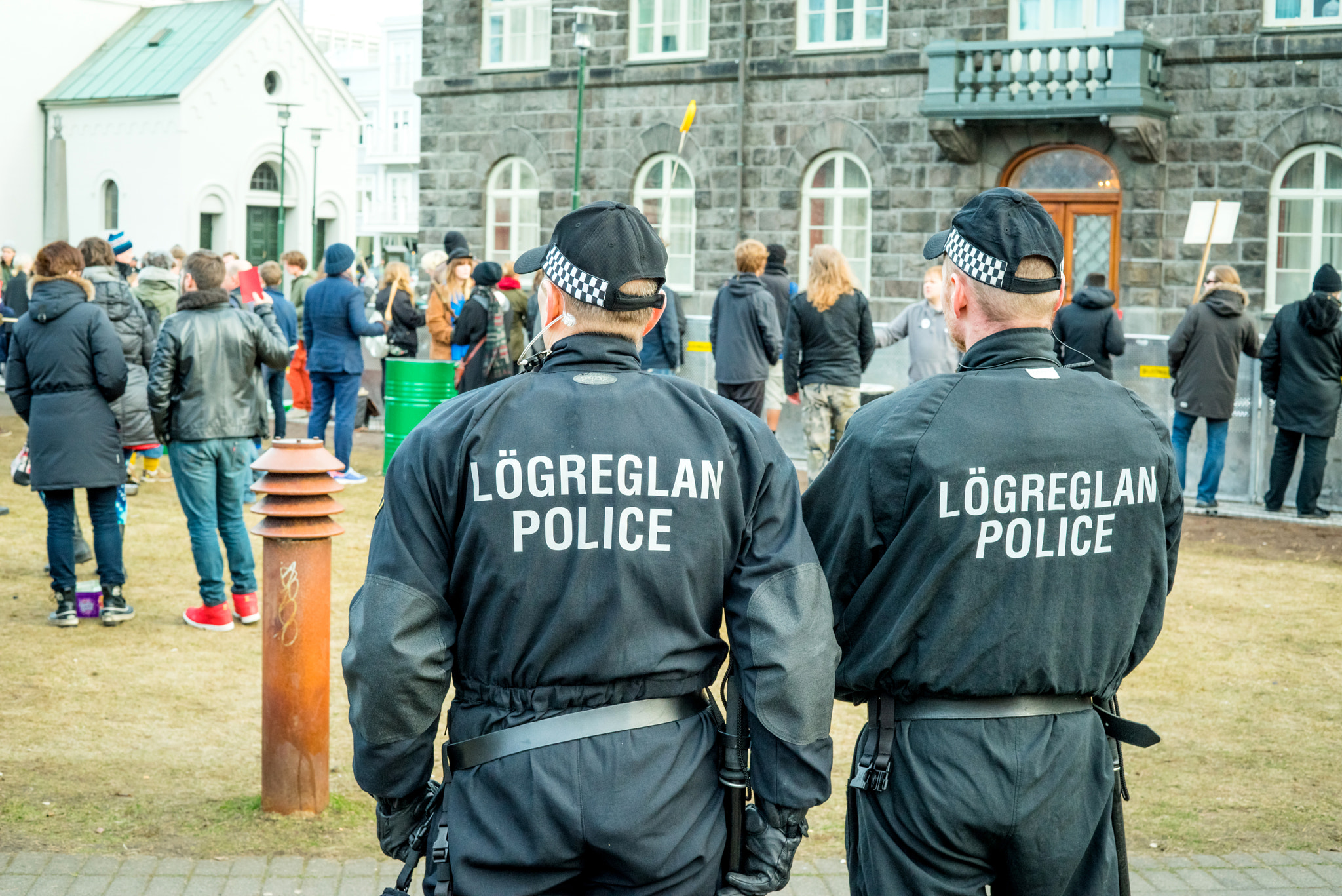Sony a7R + Sony 50mm F1.4 sample photo. Police at a demonstration against the government of iceland duri photography