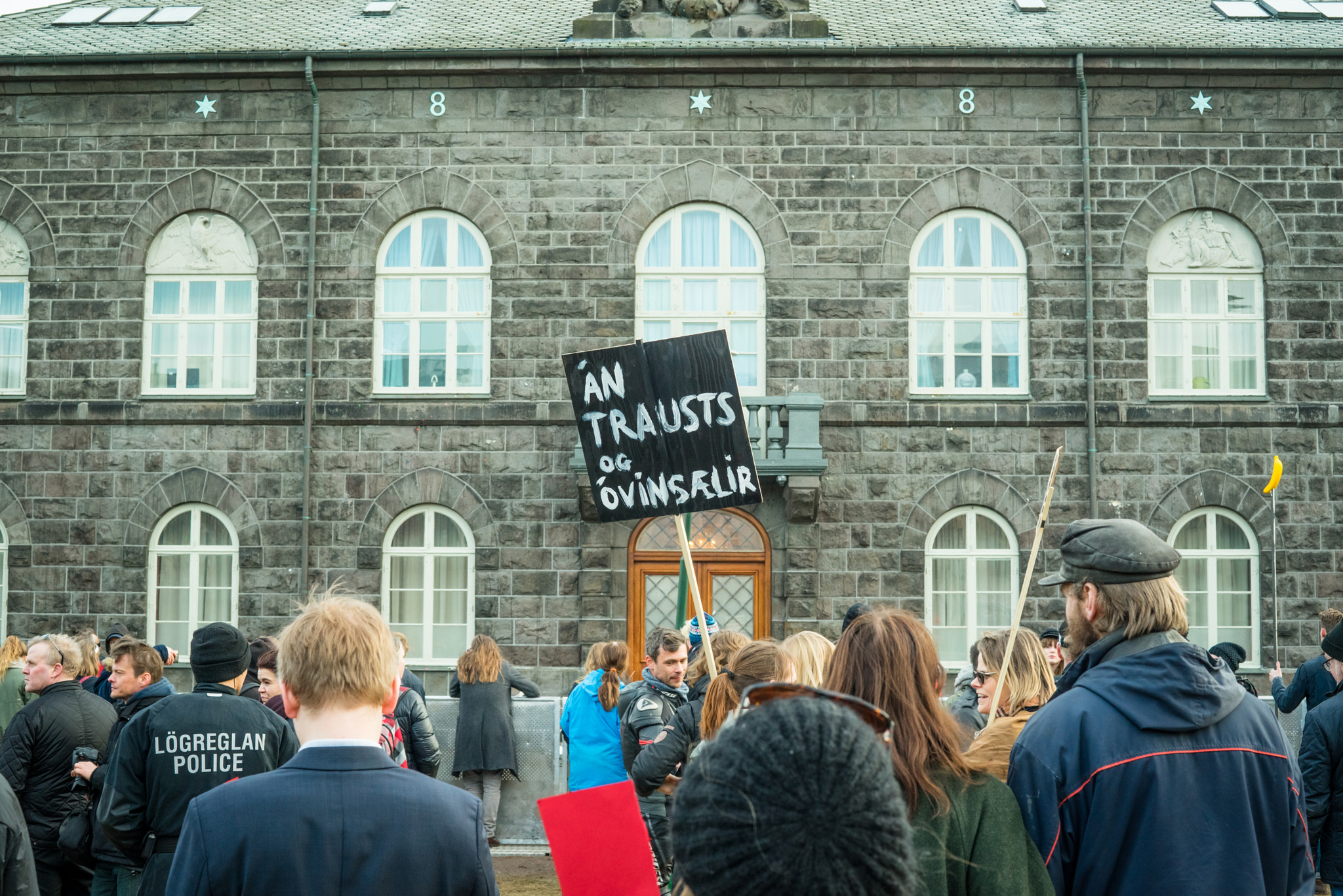 Sony a7R + Sony 50mm F1.4 sample photo. People demonstrating outside the government of iceland during th photography