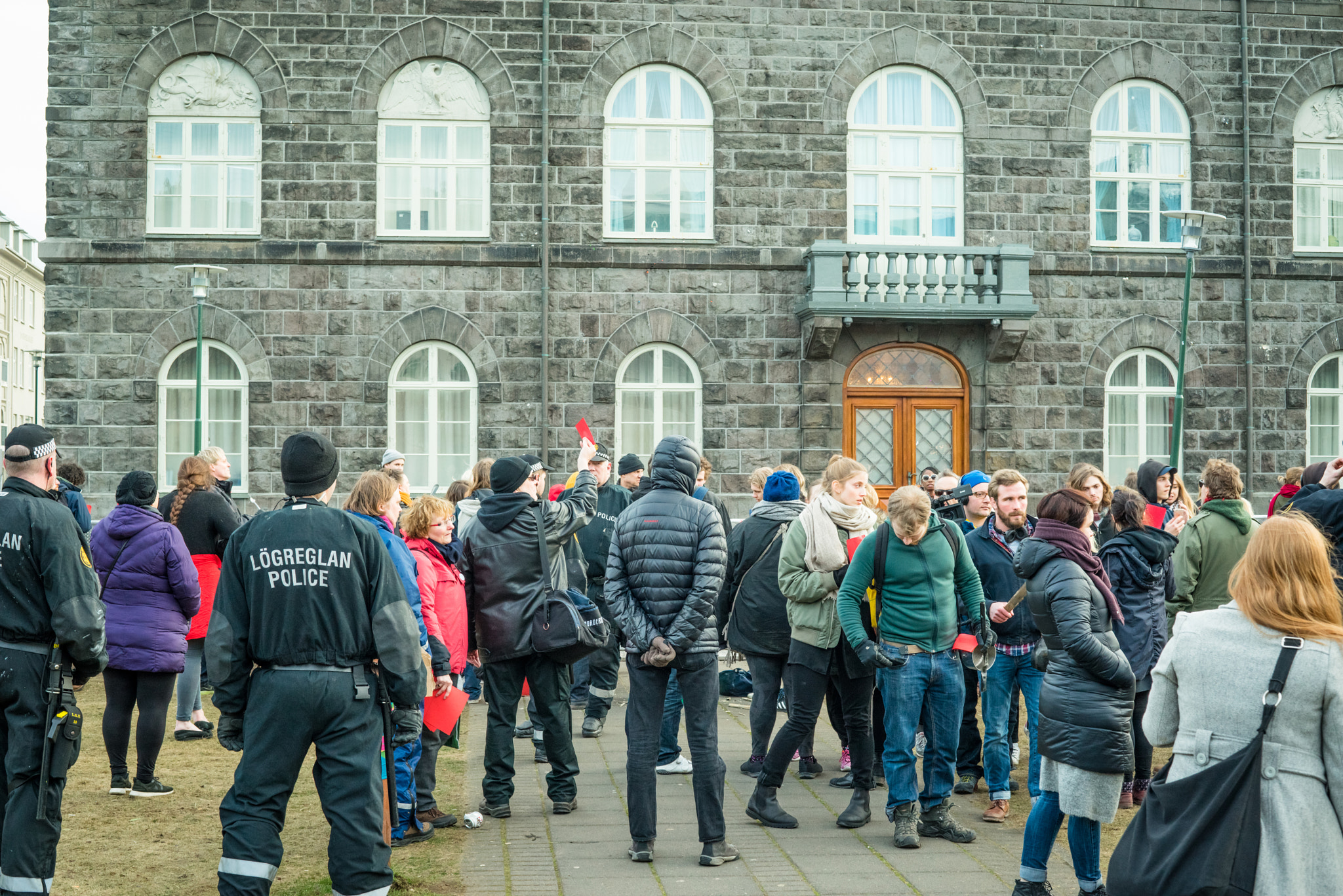 Sony a7R + Sony 50mm F1.4 sample photo. People at a public demonstration against the government of icela photography