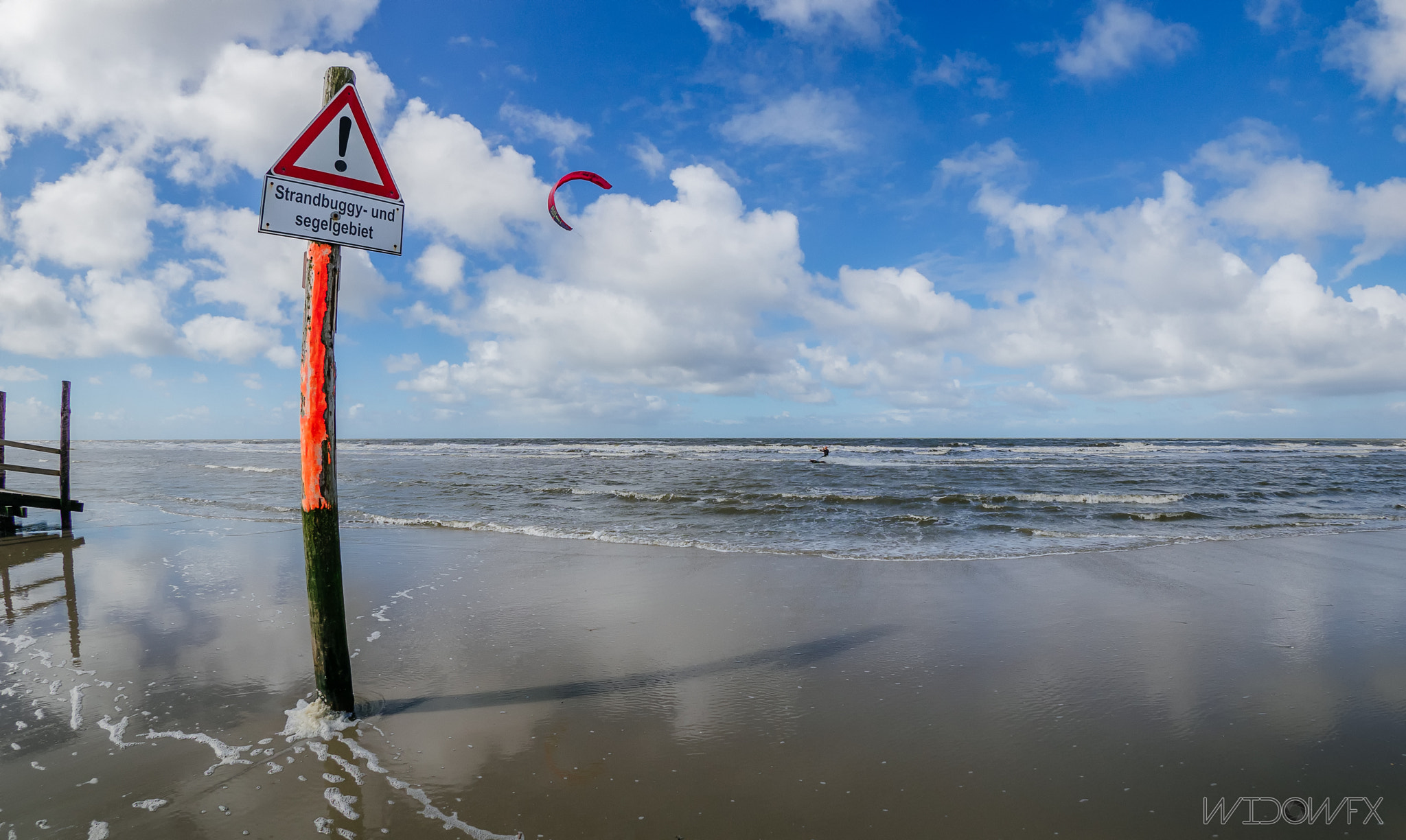 Olympus OM-D E-M1 + OLYMPUS M.8mm F1.8 sample photo. Kite surfer photography