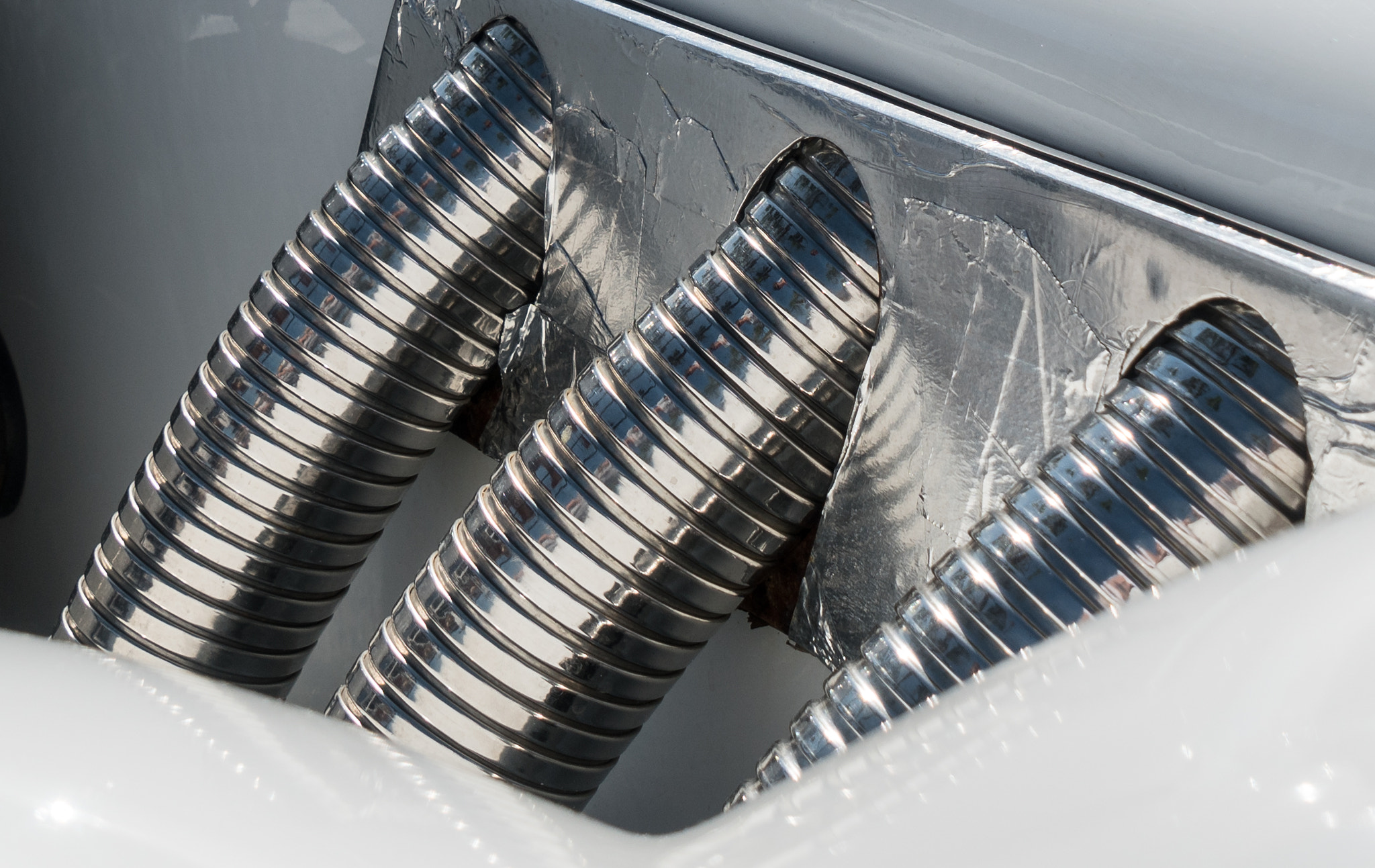 Sony a6300 + Sony Vario Tessar T* FE 24-70mm F4 ZA OSS sample photo. Pipes closeup photography
