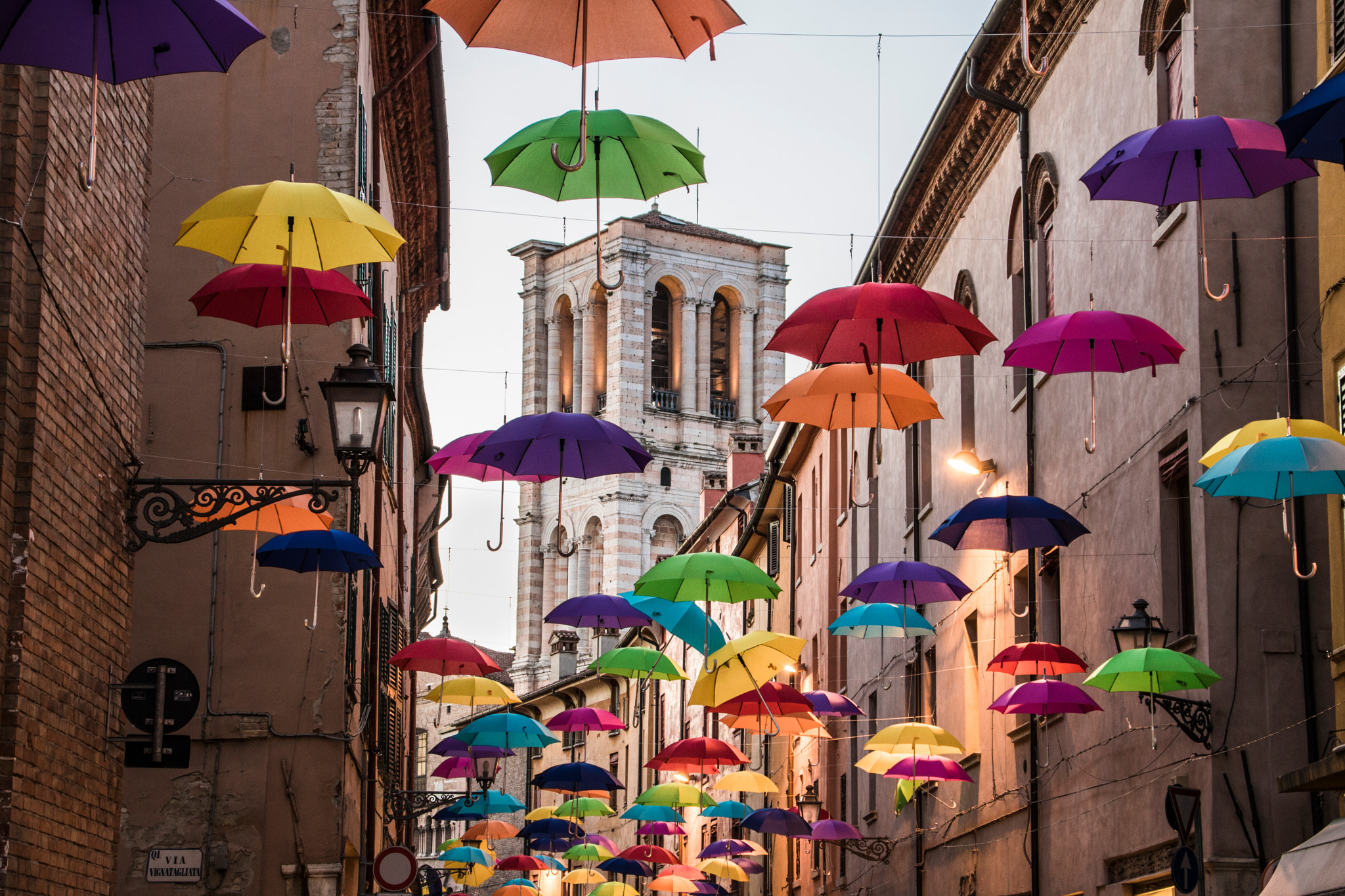 Canon EOS 760D (EOS Rebel T6s / EOS 8000D) + Canon TS-E 90mm F2.8 Tilt-Shift sample photo. Umbrellas flying (ferrara) italy photography