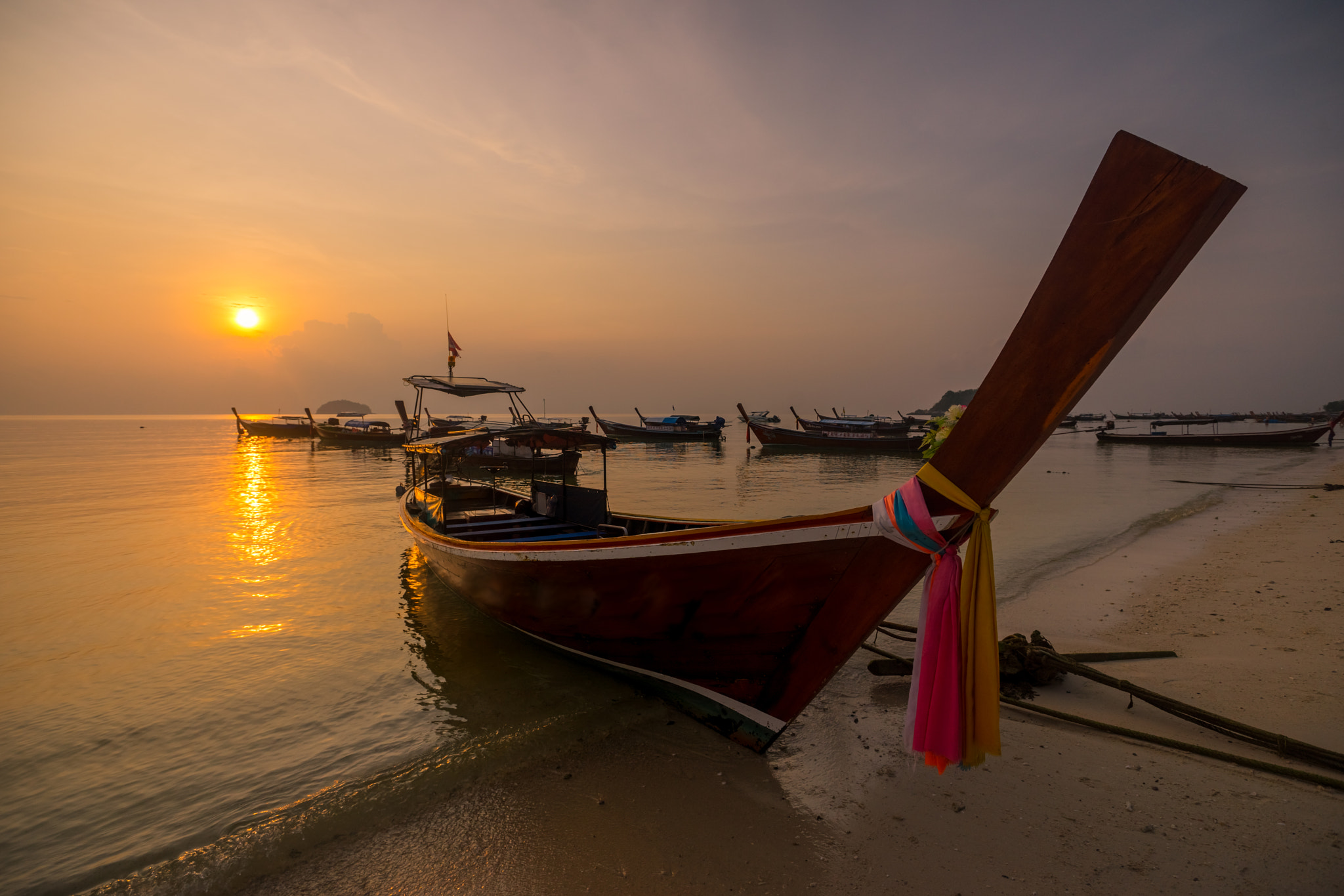 Sony a7 + Sony Vario-Sonnar T* 16-35mm F2.8 ZA SSM sample photo. Beautiful sunrise and thai fishing boats  at lipe island  ,  sat photography