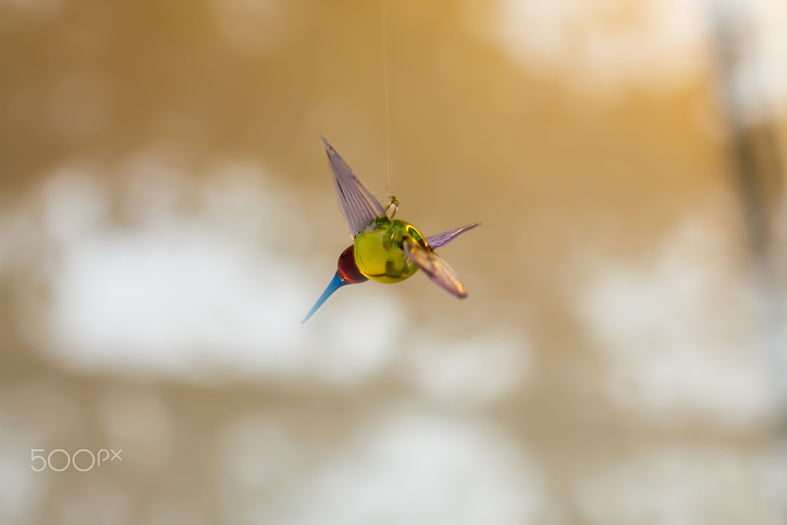 Canon EOS 650D (EOS Rebel T4i / EOS Kiss X6i) + Canon EF 50mm F1.2L USM sample photo. Suspended glass bird photography