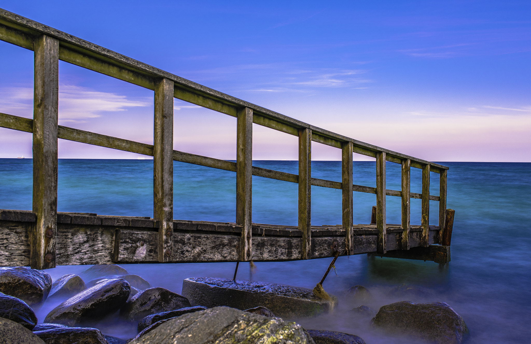 AF-S Nikkor 35mm f/1.8G sample photo. Bridge into the sea photography