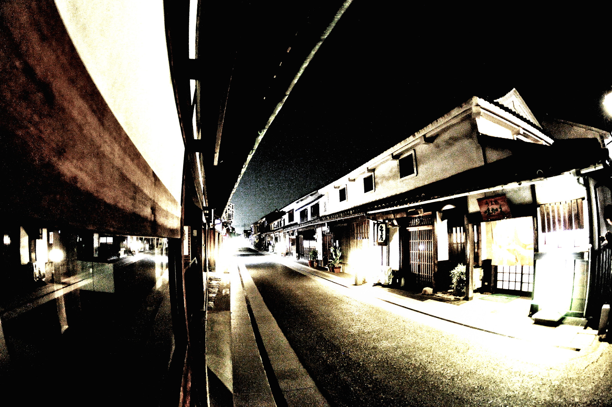 Tokina AT-X 10-17mm F3.5-4.5 DX Fisheye sample photo. Street at night photography